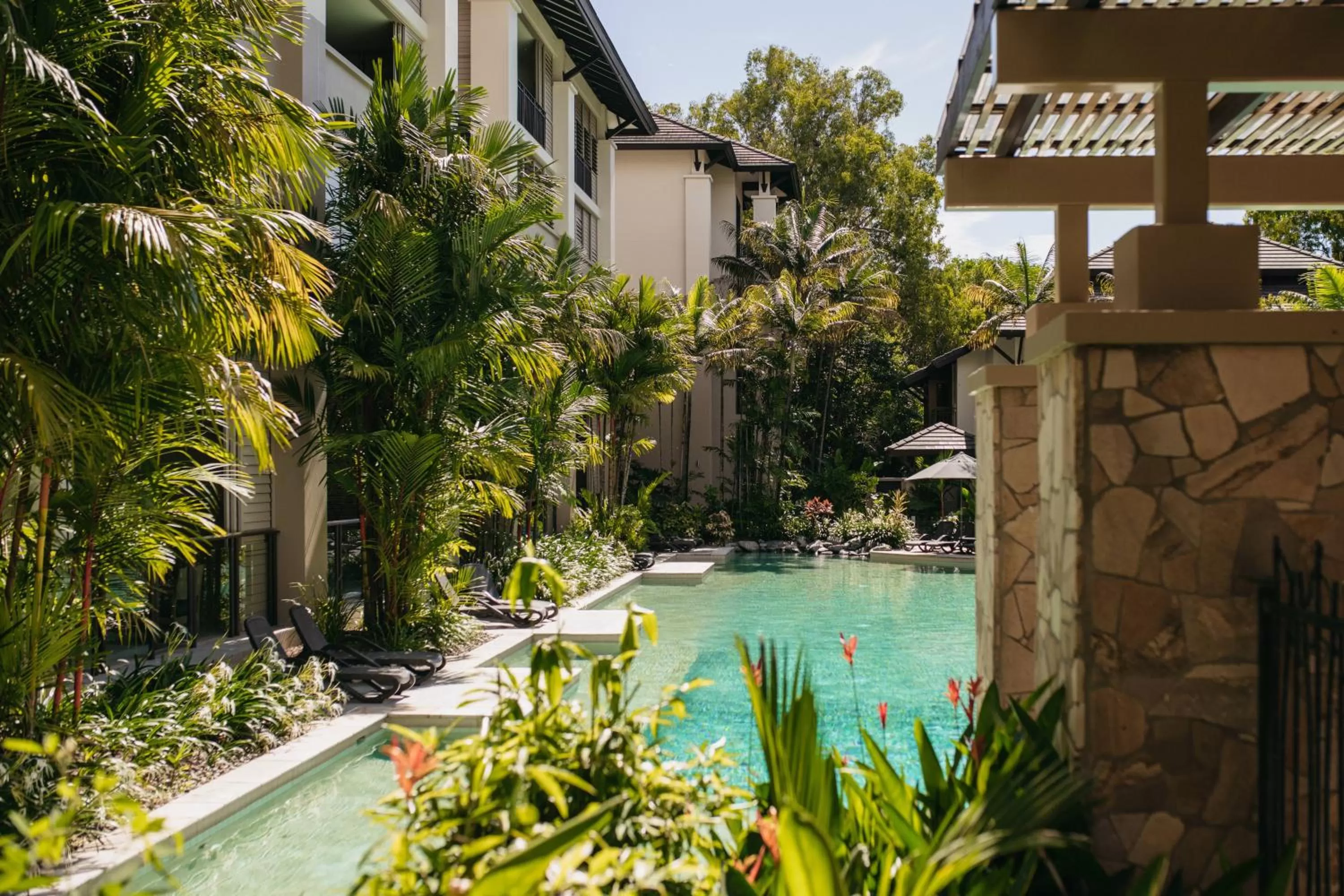 Swimming pool in Pullman Palm Cove Sea Temple Resort & Spa