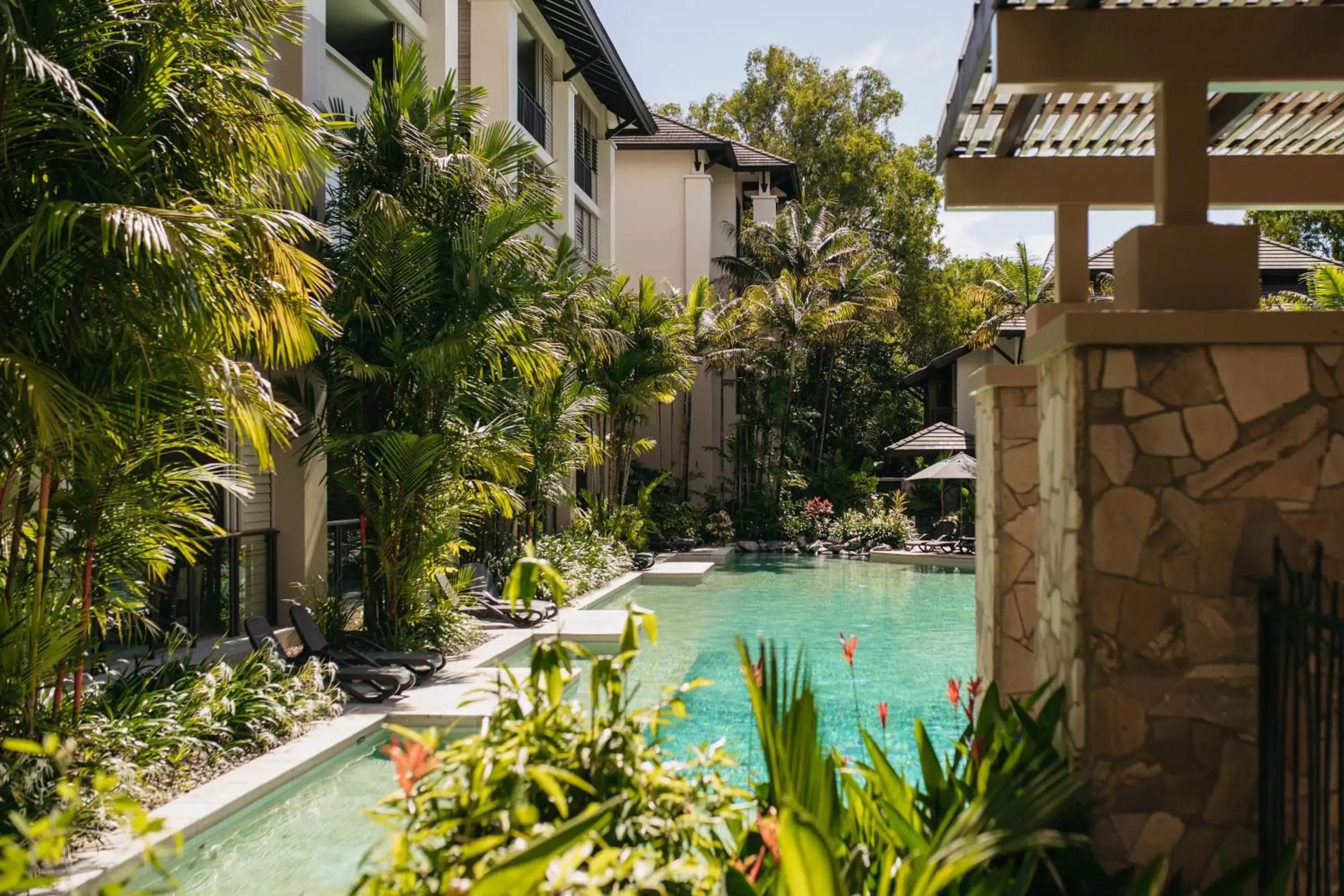 Swimming pool in Pullman Palm Cove Sea Temple Resort & Spa Swimming pool in Pullman Palm Cove Sea Temple Resort & Spa