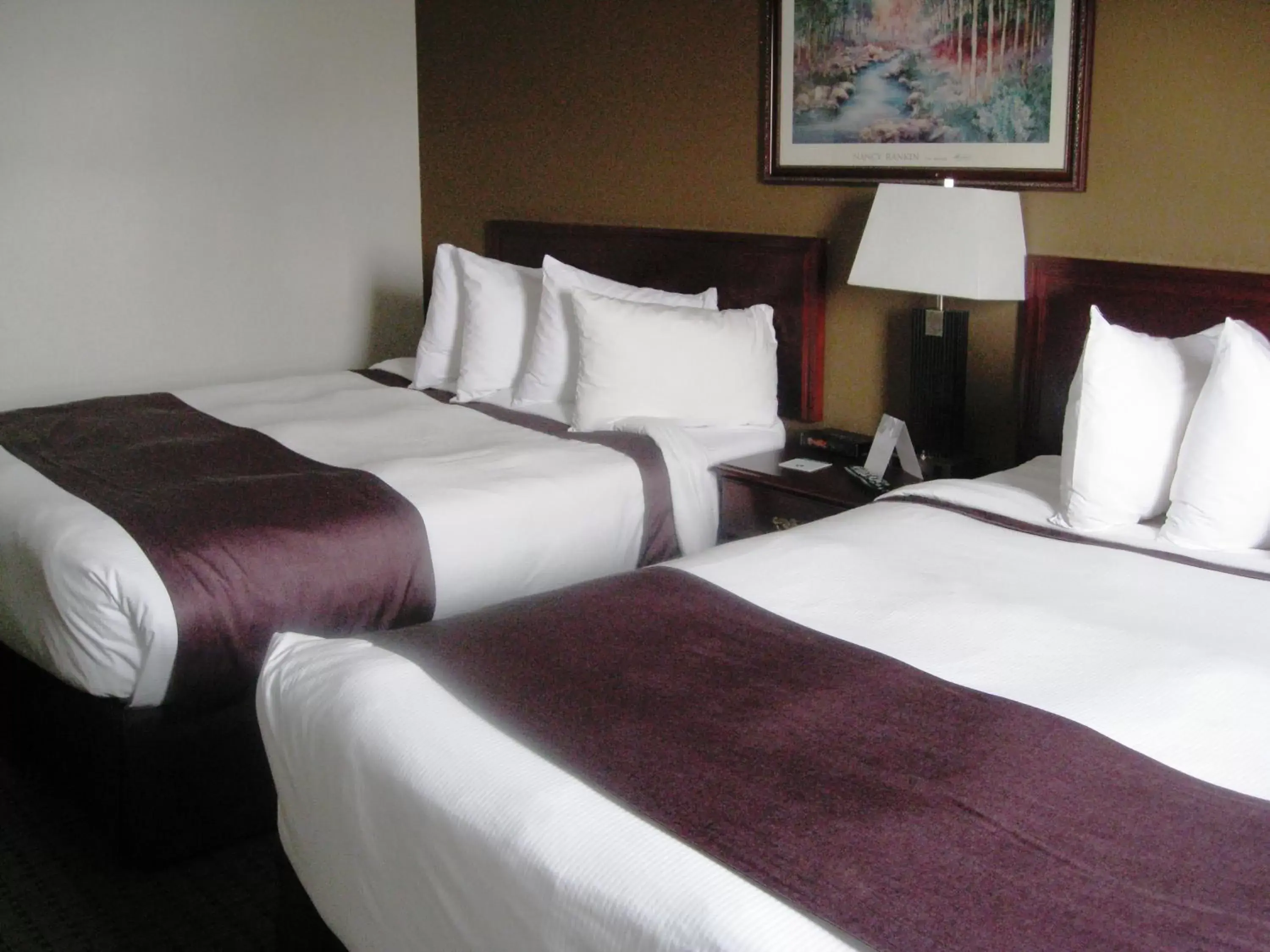 Photo of the whole room, Bed in Ramada by Wyndham Red Deer Hotel & Suites