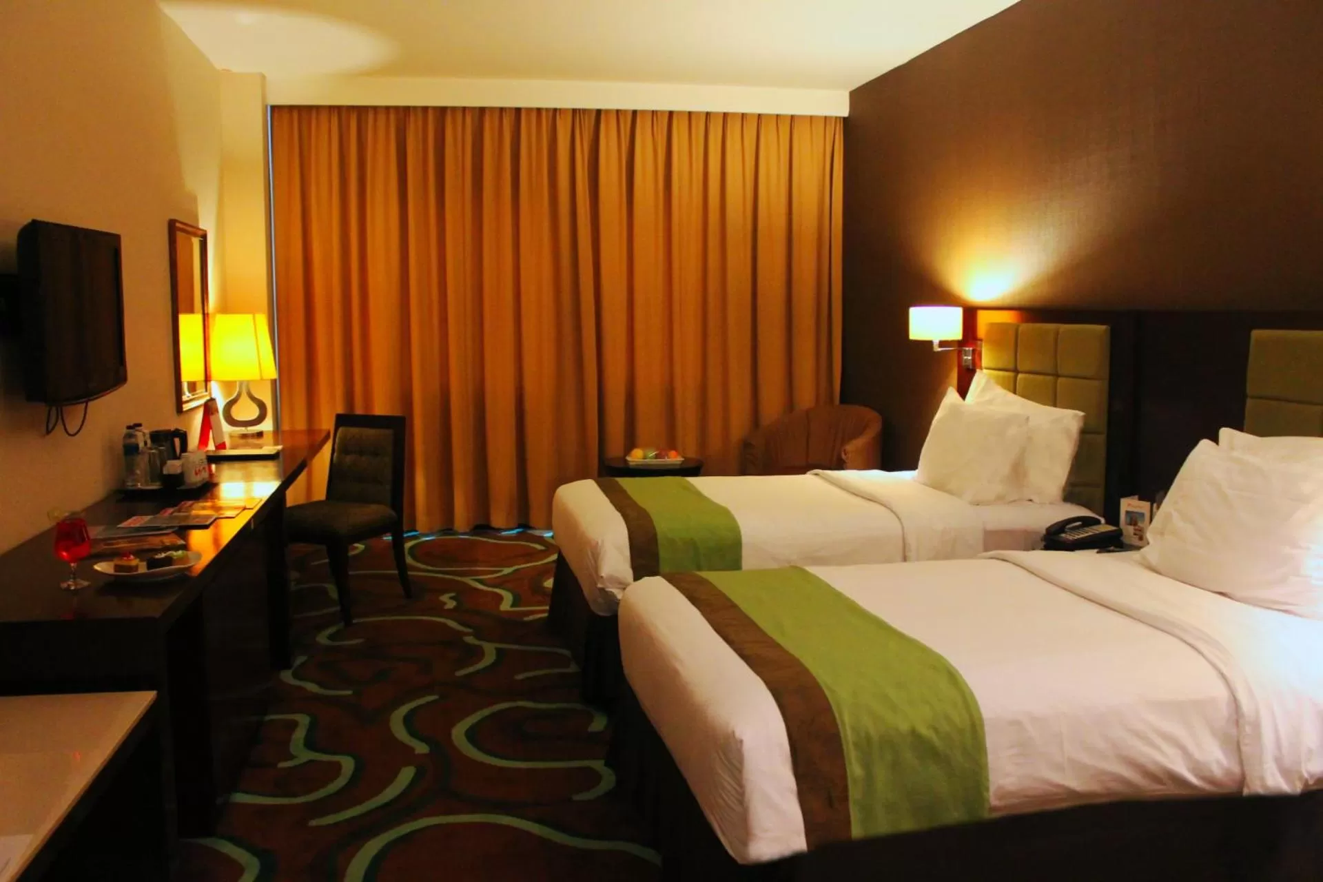 Bed in Swiss-Belhotel Ambon