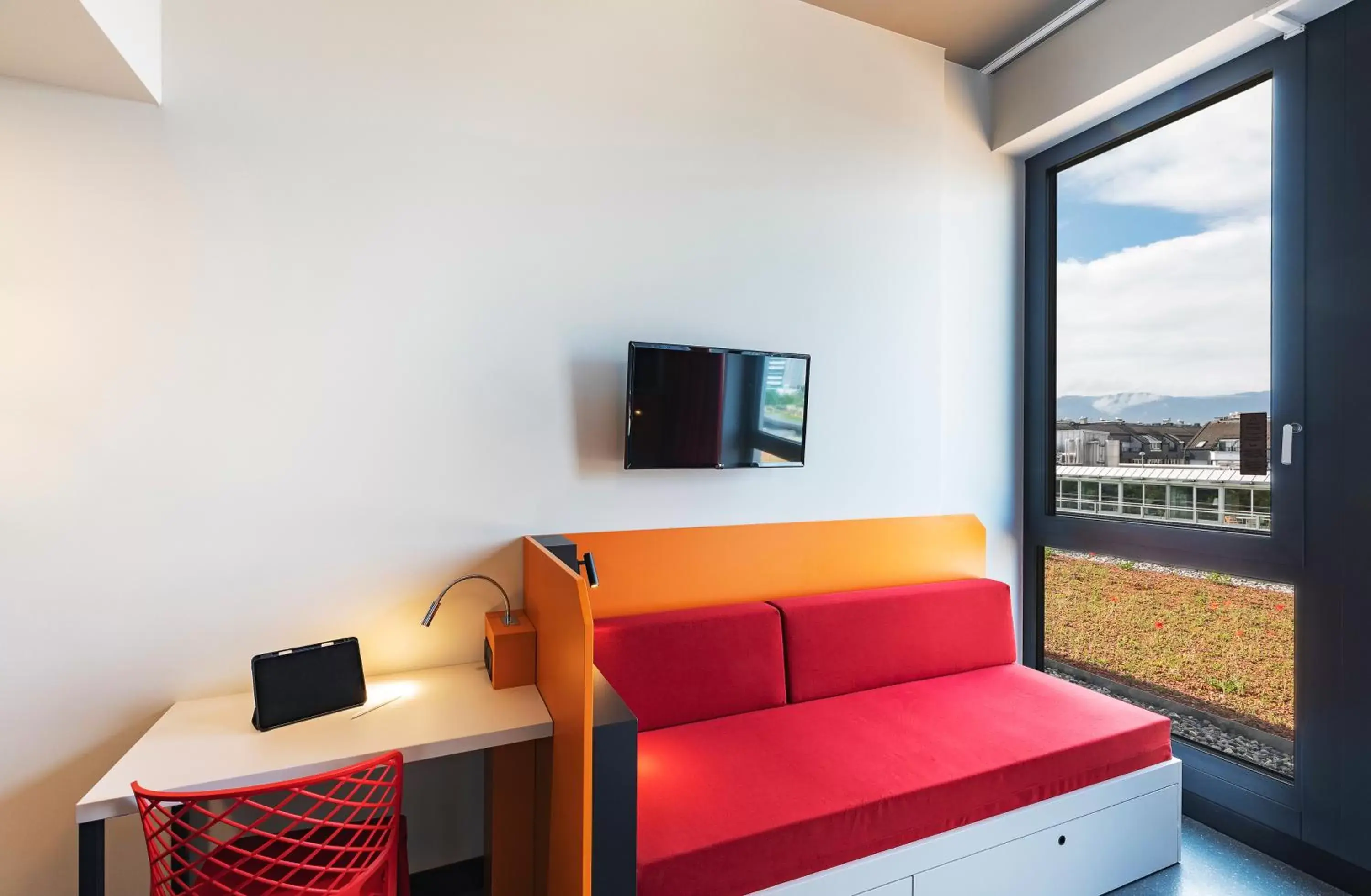 Bedroom, Seating Area in MEININGER Hotel Genève Centre Charmilles