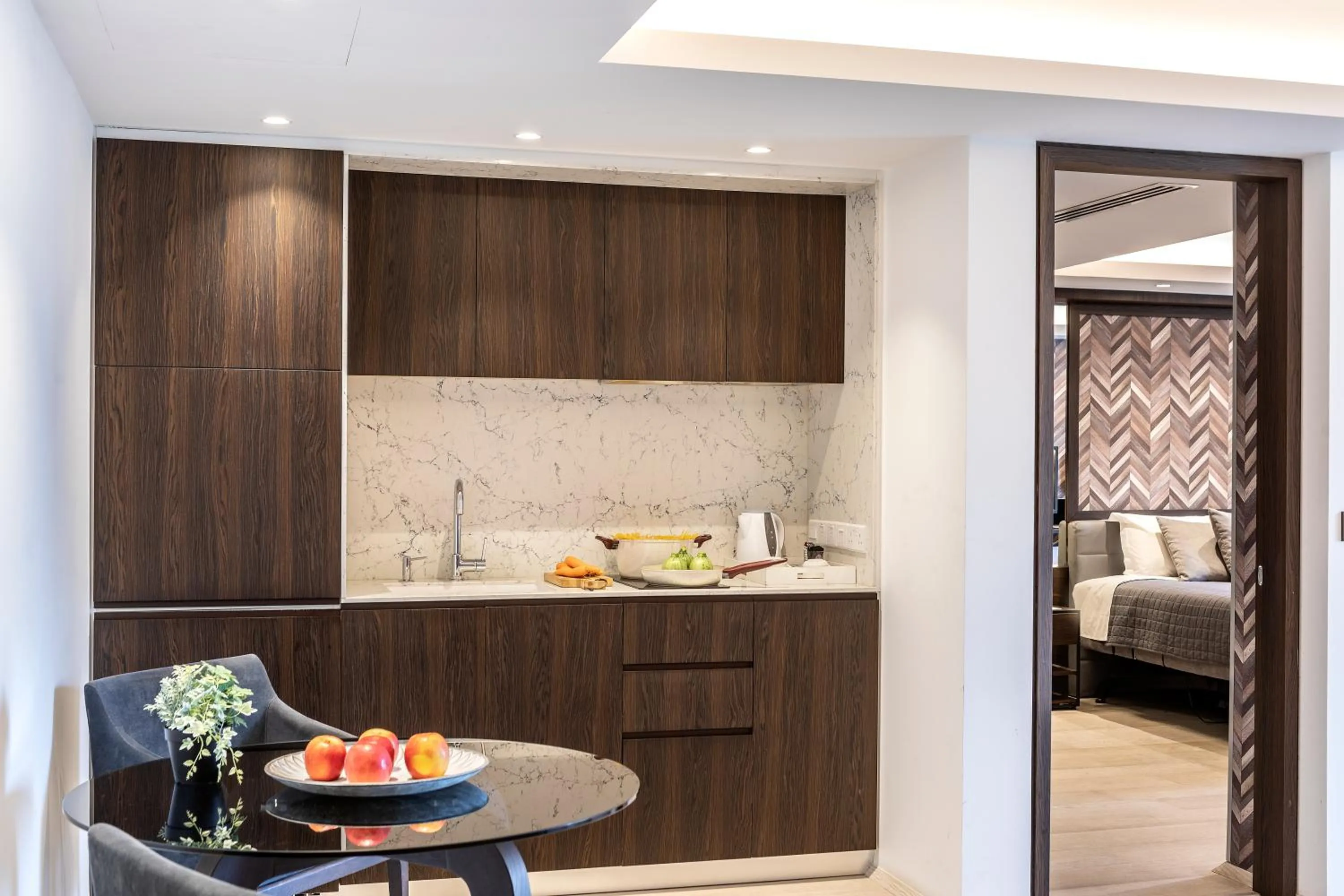 Kitchen or kitchenette, Bed in Almond Business Hotel