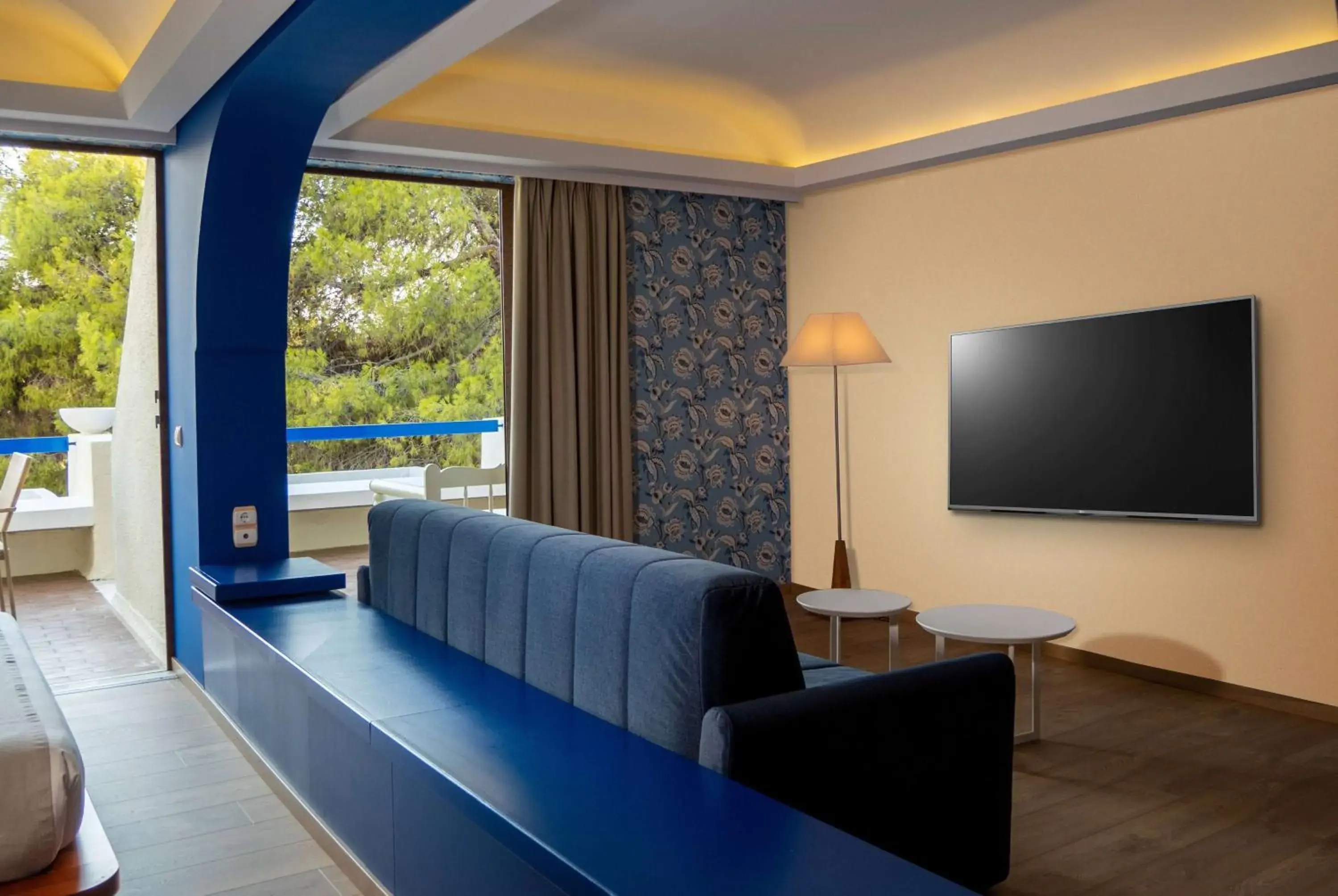 Photo of the whole room, Seating Area in Ramada Loutraki Poseidon Resort