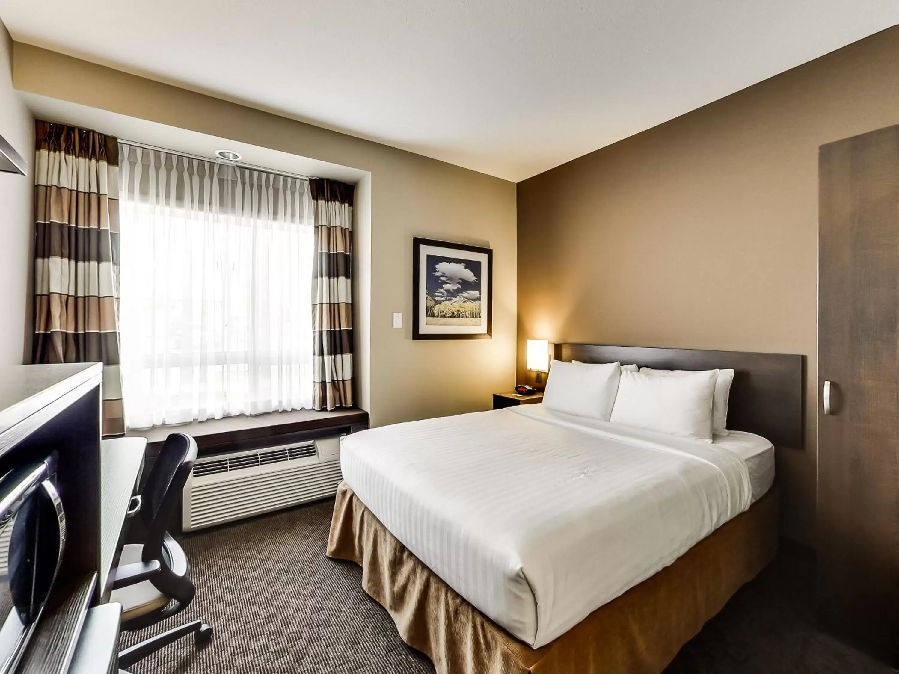 Bedroom, Bed in Microtel Inn & Suites by Wyndham Red Deer