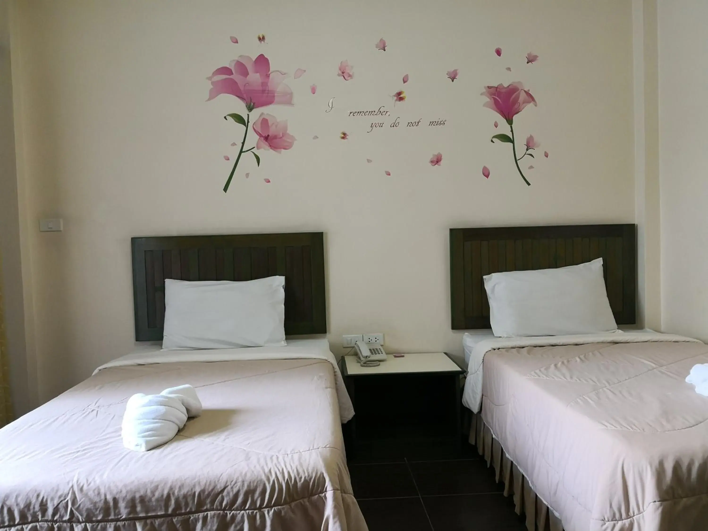 Bed in Baan Suksiri Hotel (SHA Extra Plus)