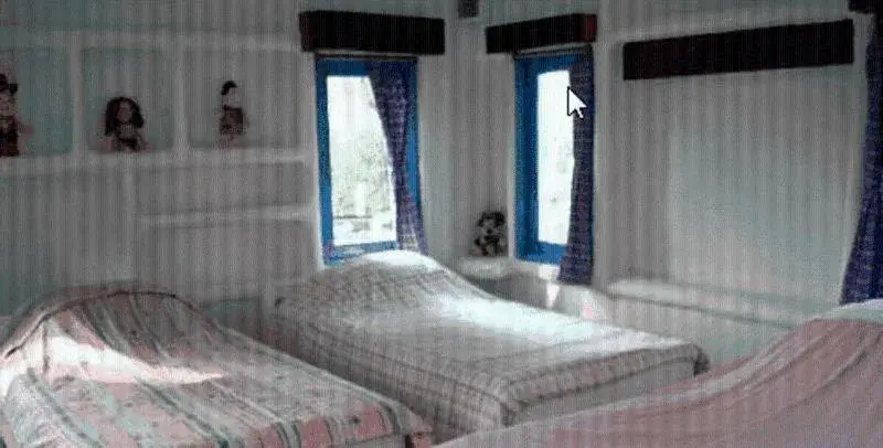 Bed in Scenic Riverside Resort