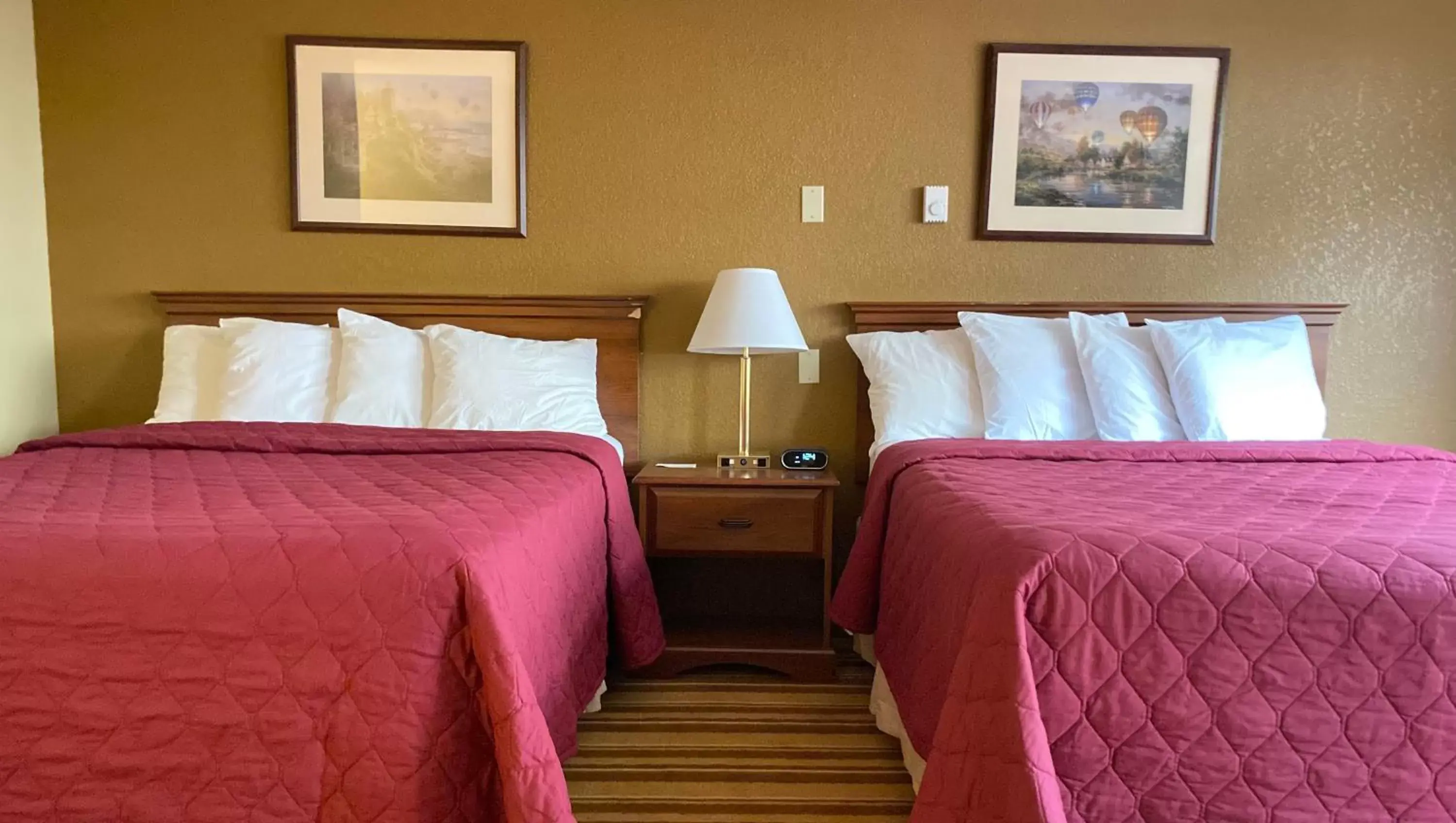 Queen Room with Two Queen Beds in Magnuson Copper Crown Queen Room with Two Queen Beds in Magnuson Copper Crown