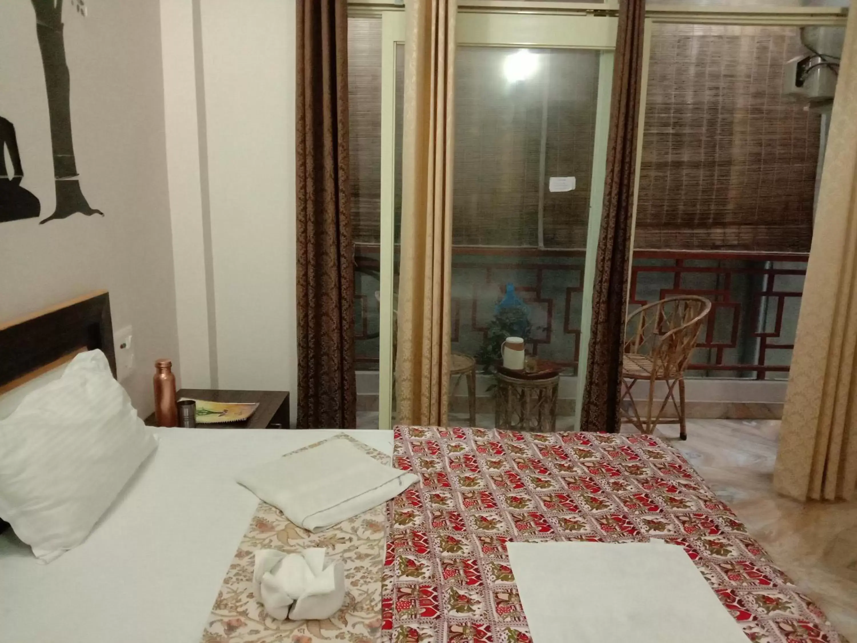 Bed in Rudram Hotel Yoga & Ayurveda Retreat