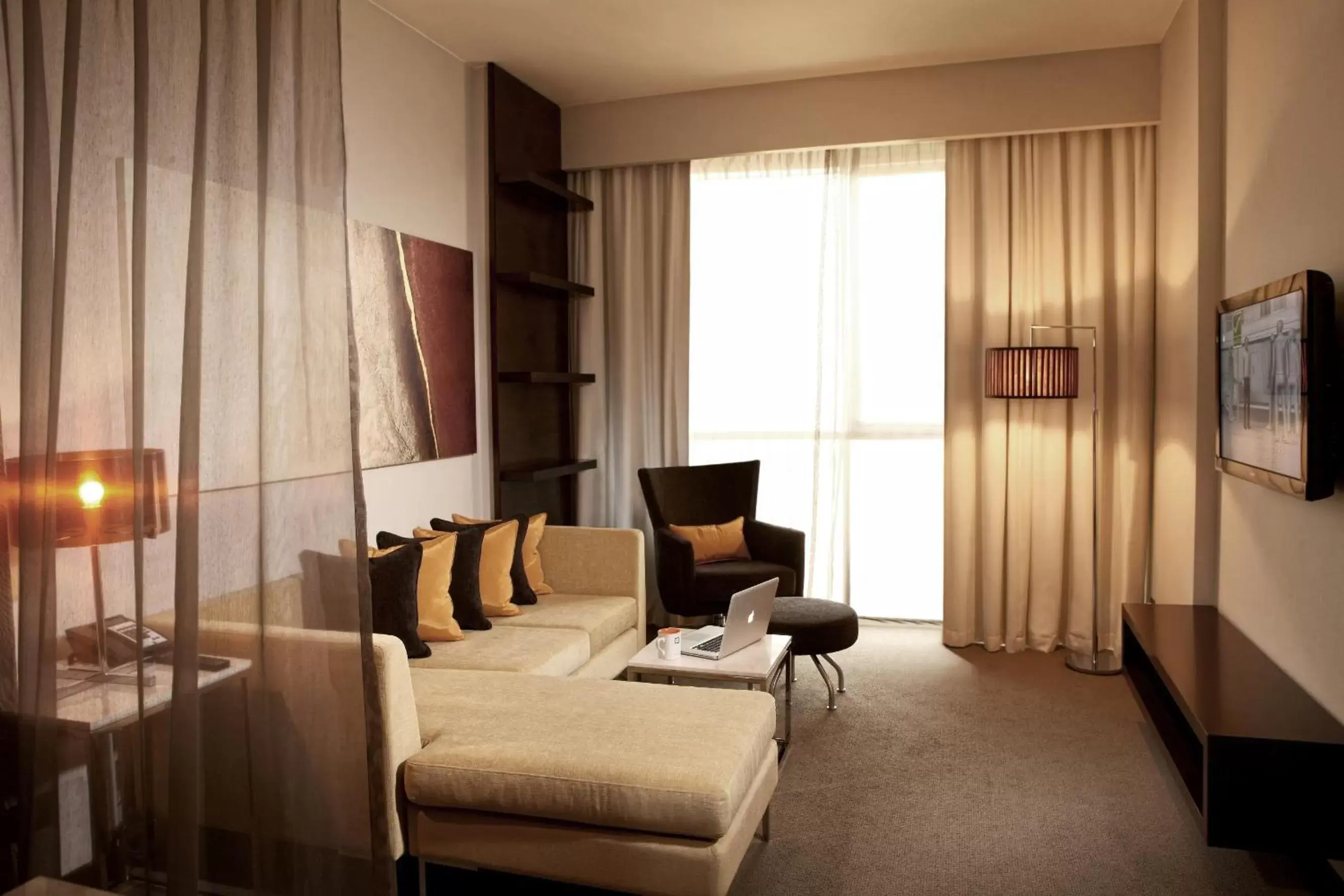 Living room, Seating Area in Centro Sharjah - by Rotana