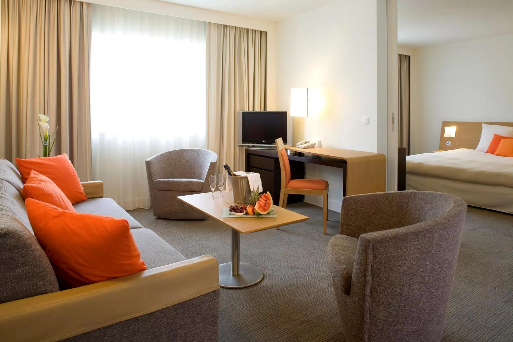 Living room, Bed in Novotel Belfort Centre Atria