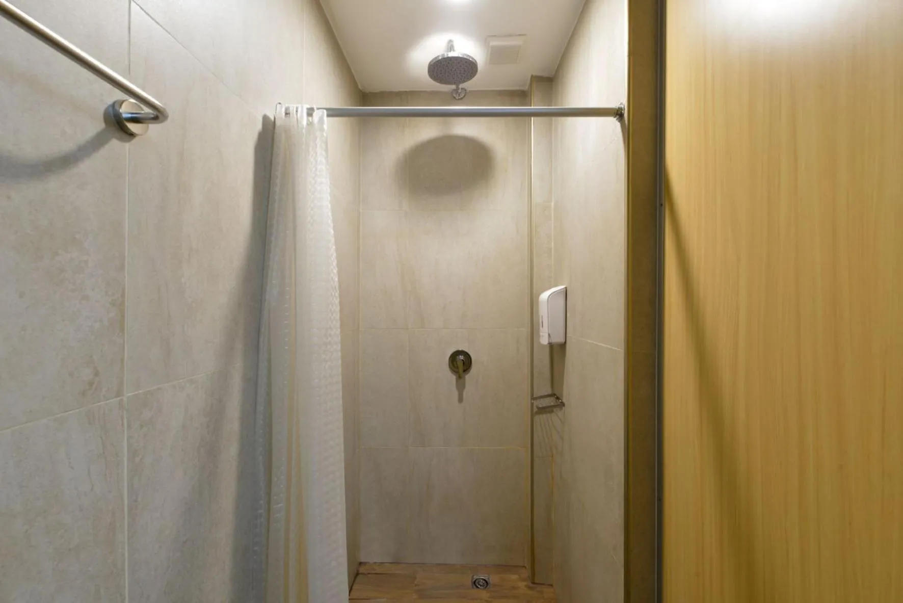 Shower in StayAt Bedever Bangkok Hotel