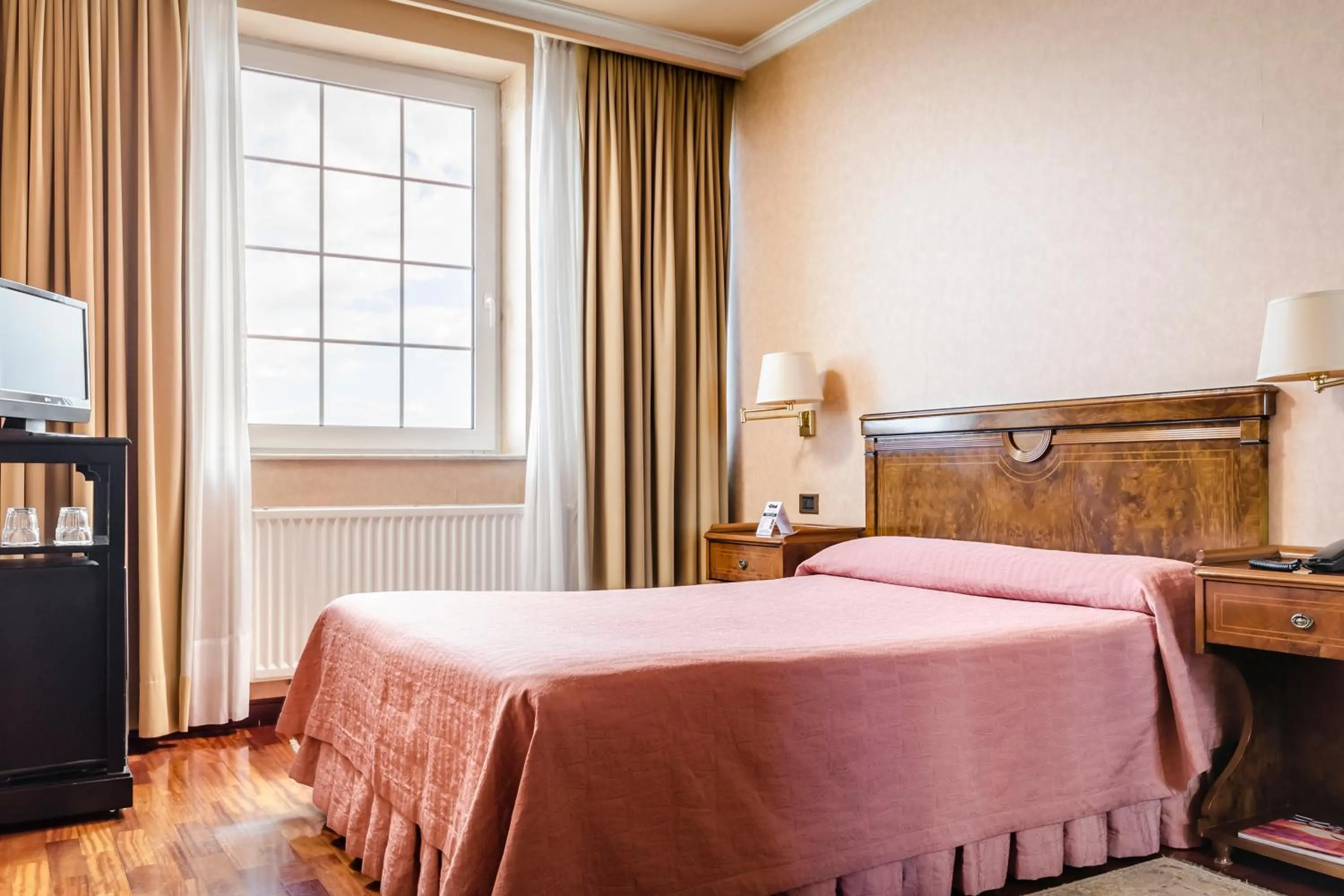 Bed in Hotel Alcomar