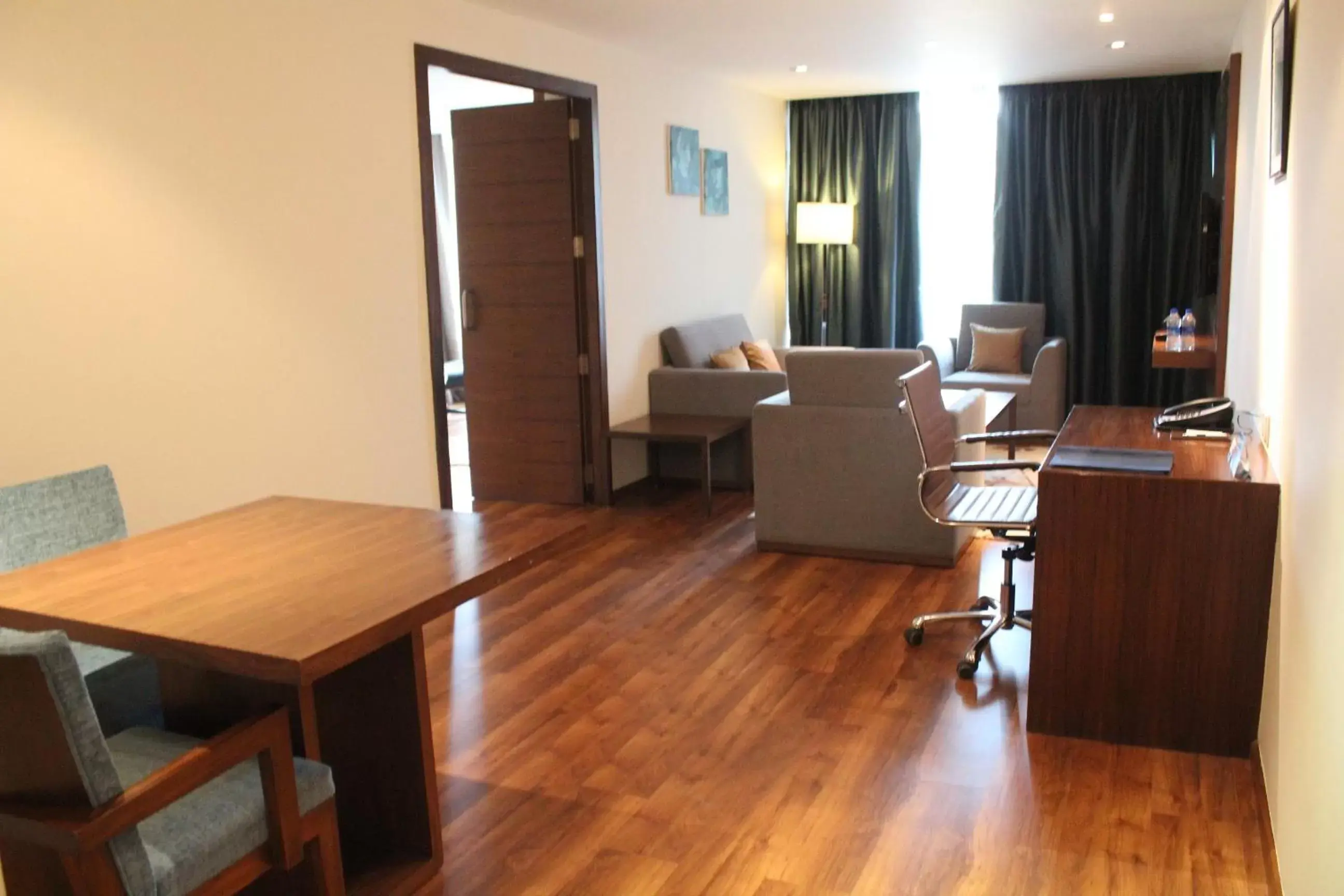 Living room, Dining Area in Radisson Blu Plaza Hotel Hyderabad Banjara Hills