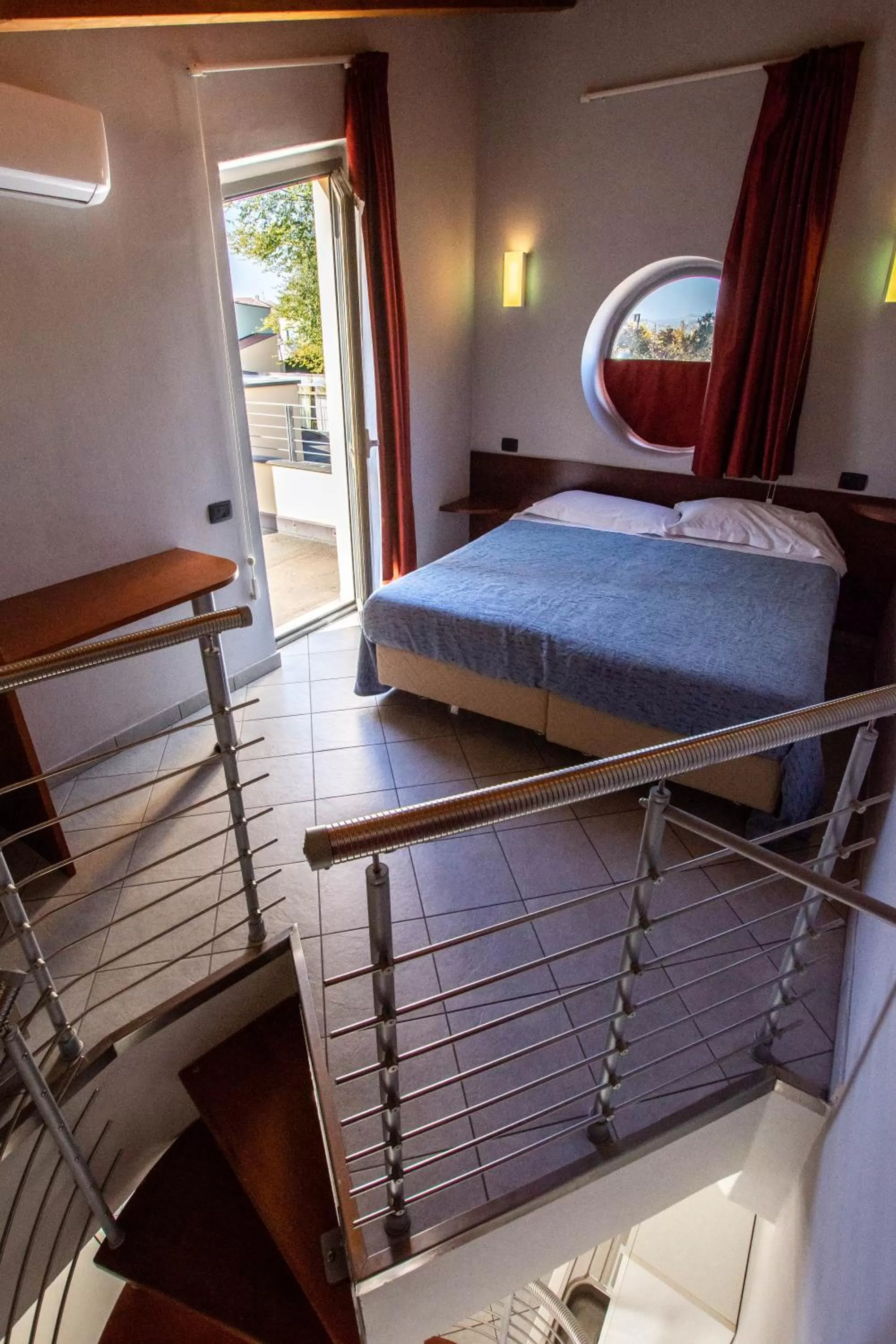 Bed in AgriCamping AlbaVillage Hotel & Wellness