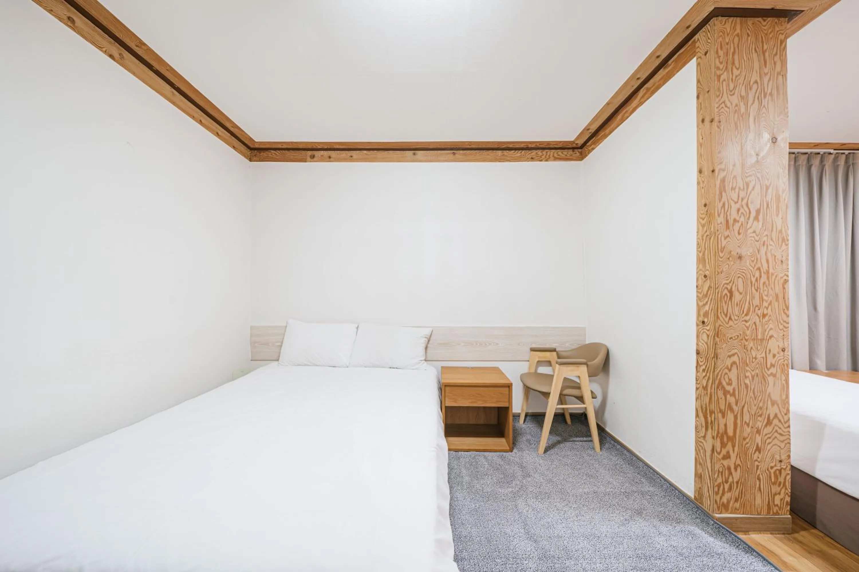 Bed in Jeju Miracle Hotel