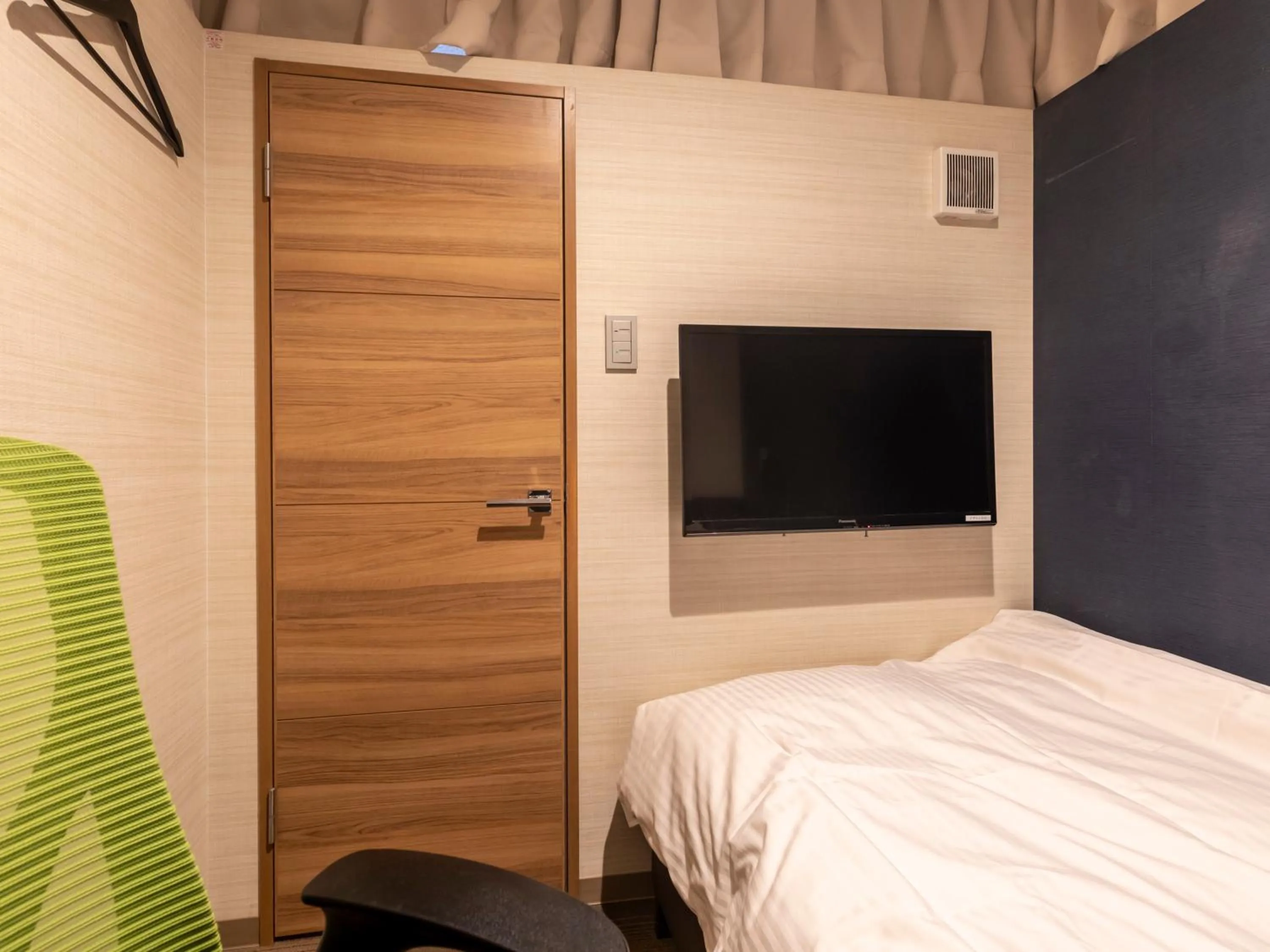 Bed in Tabist Hotel Smart Sleeps Oita Station