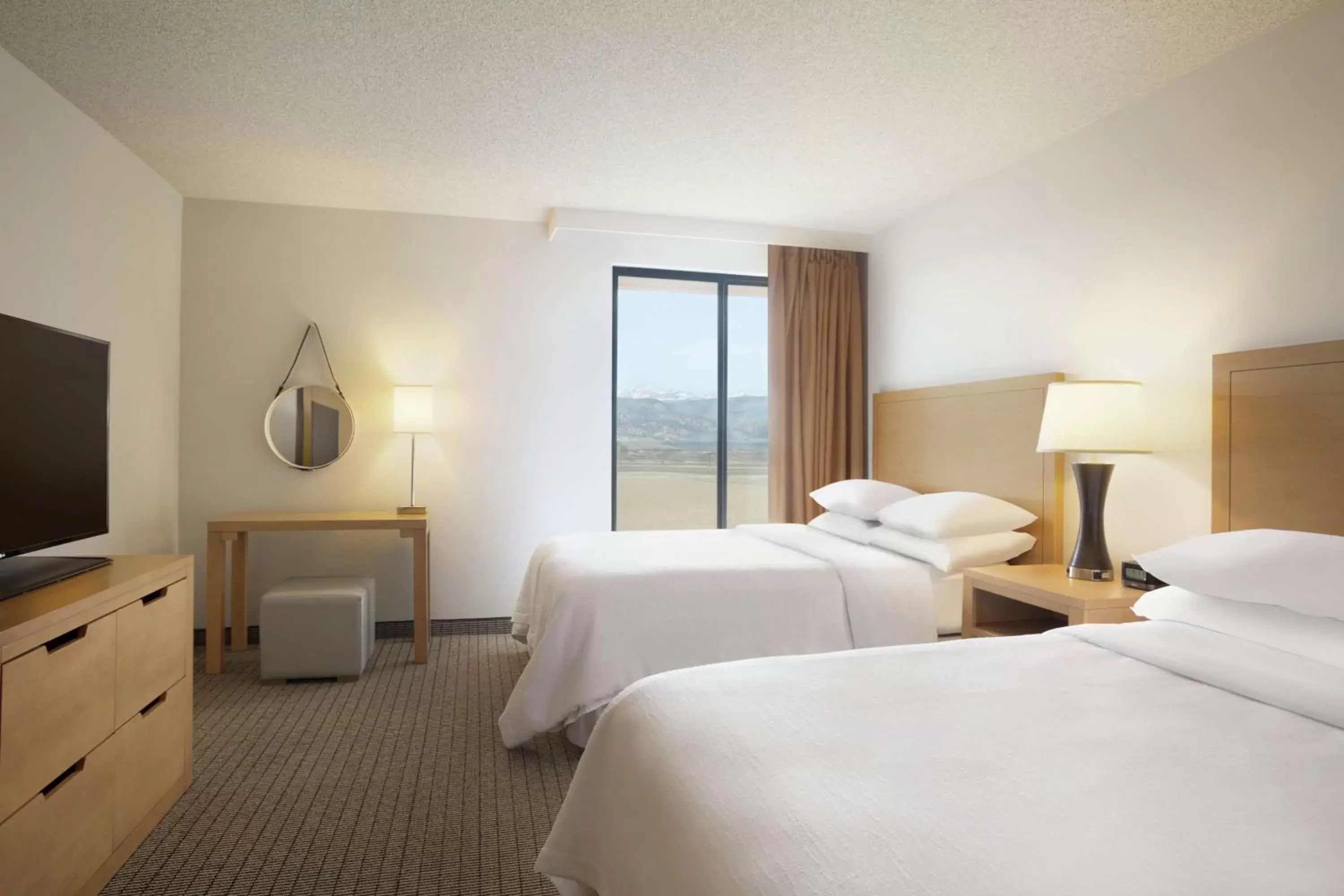 Bedroom in Embassy Suites by Hilton Denver International Airport