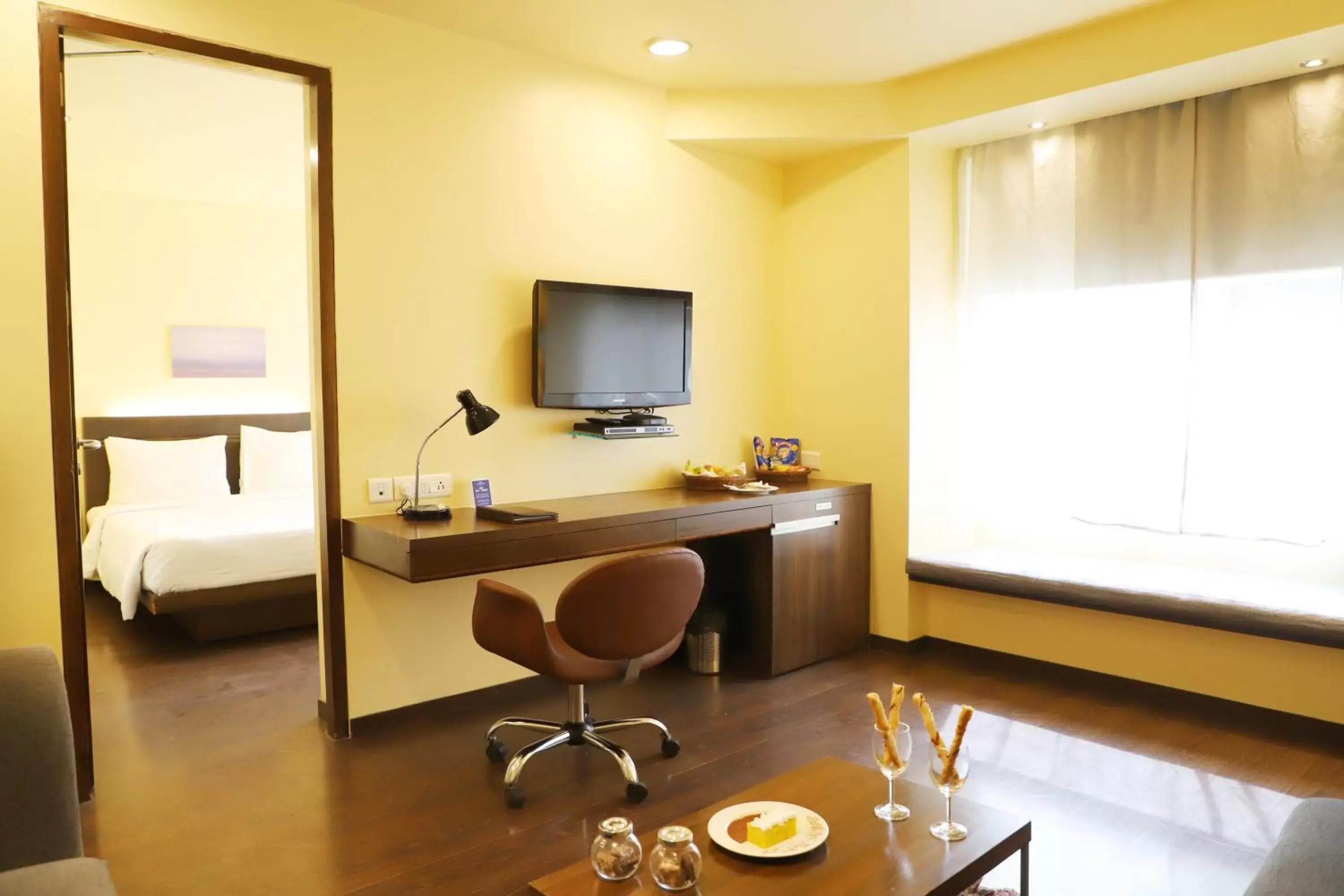 Living room, TV/Entertainment Center in Marasa Sarovar Portico -Rajkot