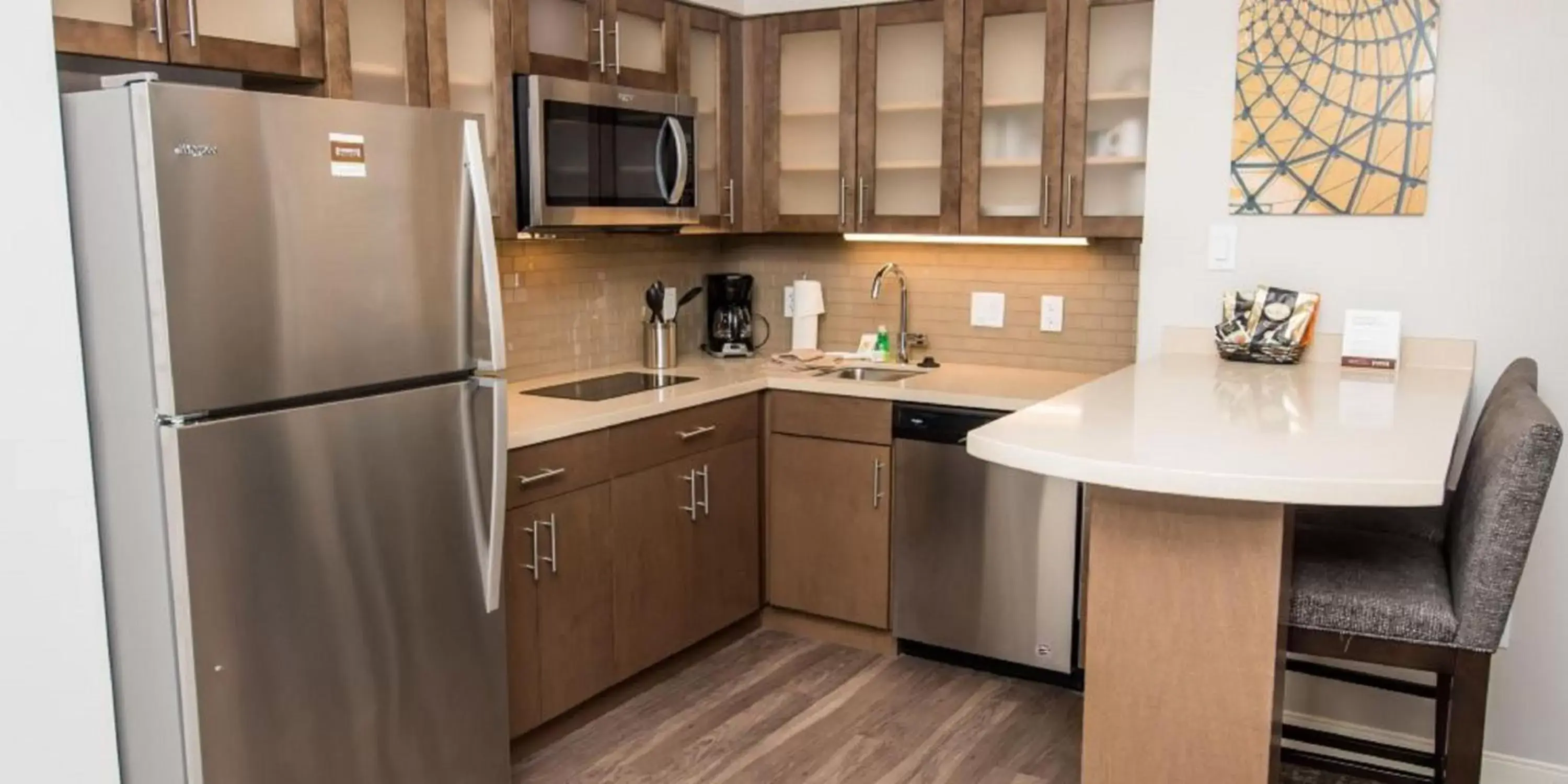 Photo of the whole room, Kitchen/Kitchenette in Staybridge Suites Houston East - Baytown, an IHG Hotel