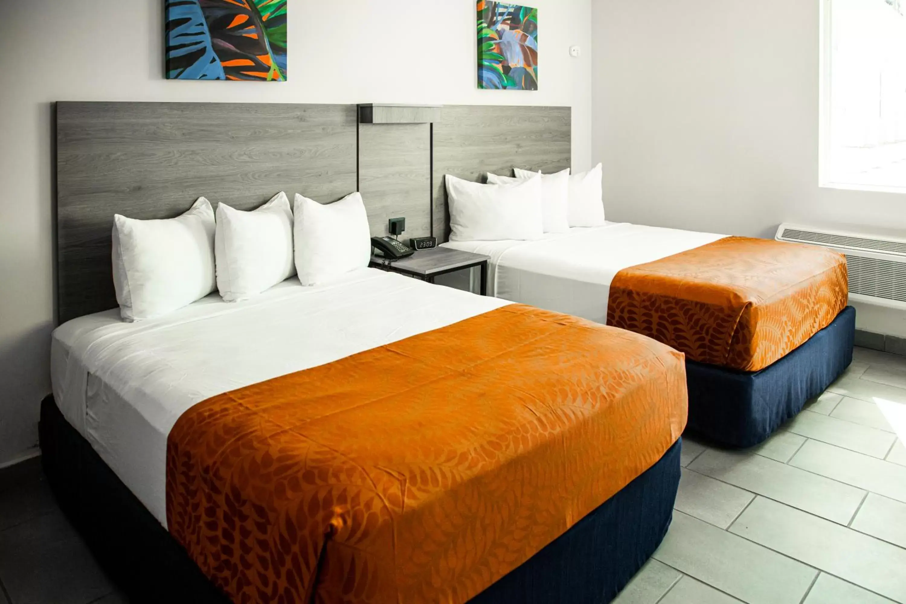 Bed in Mayaguez Plaza Hotel; SureStay Collection by Best Western