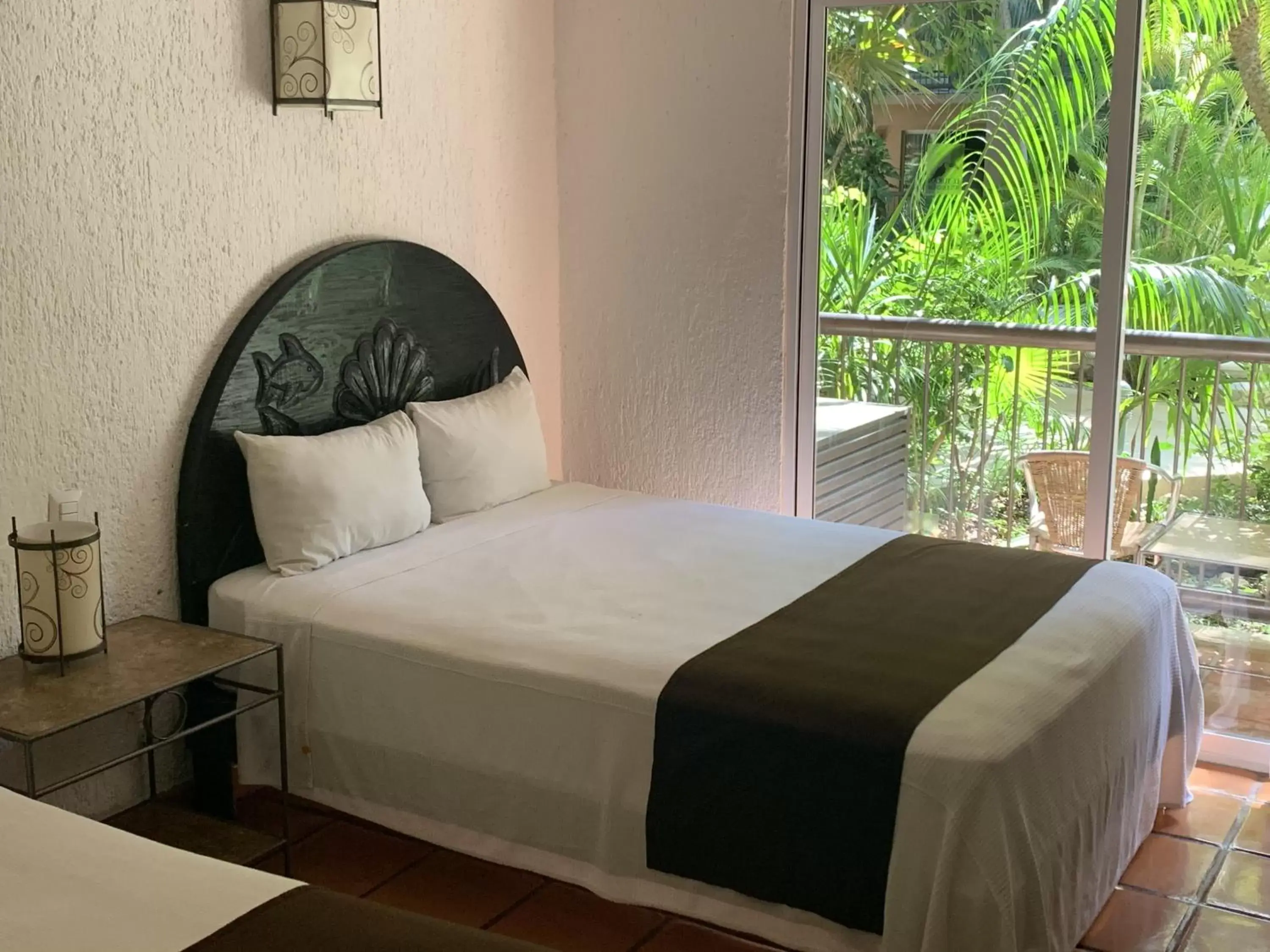 Bed in Tukan Hotel Playa del Carmen