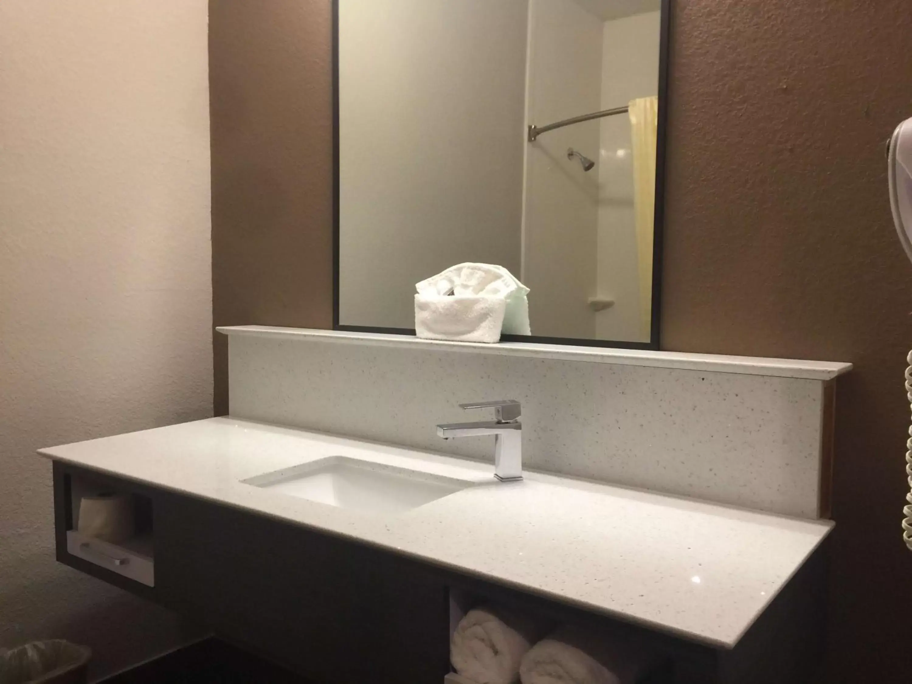 Bathroom in SureStay Hotel by Best Western Brownsville