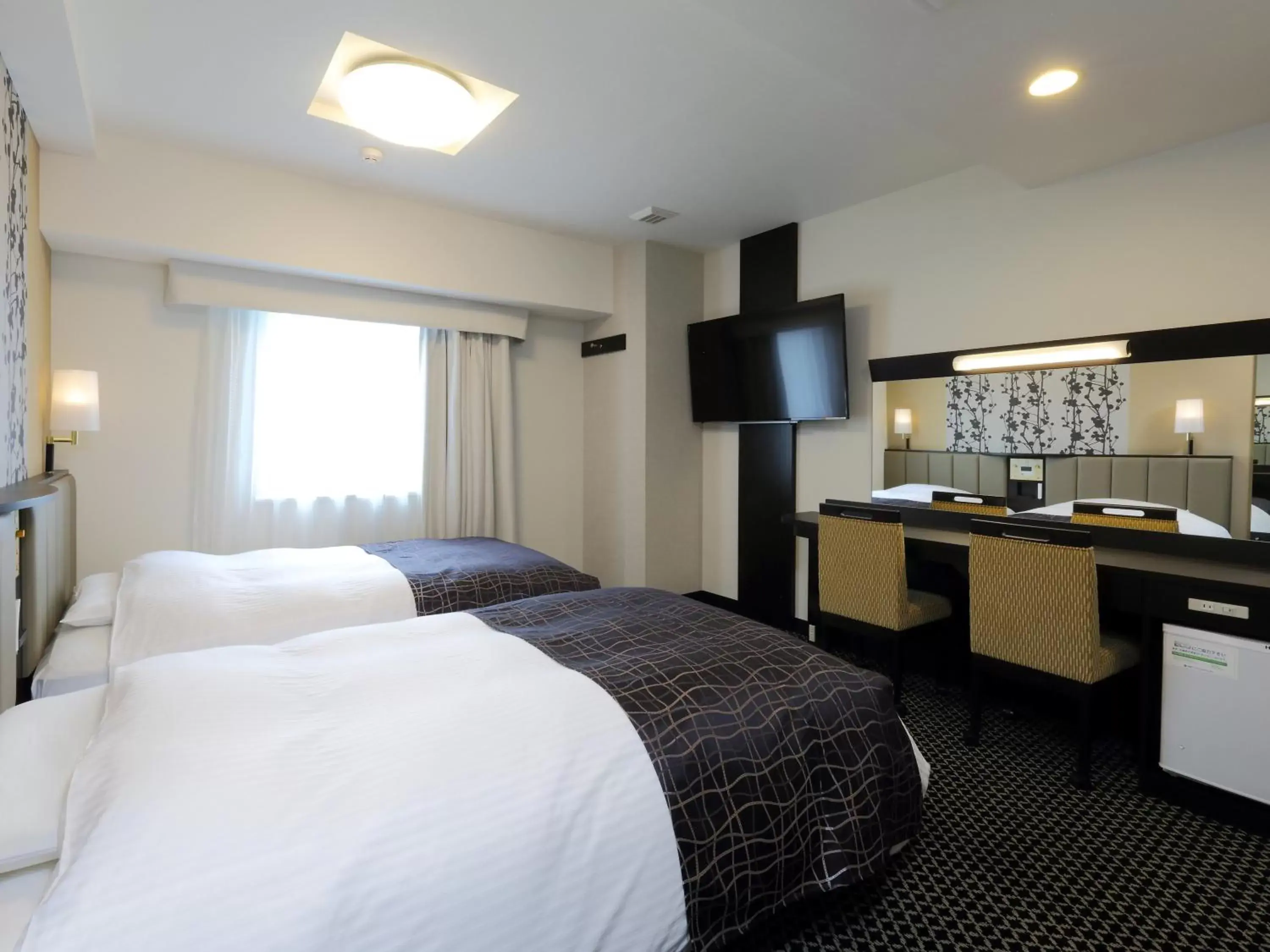 Photo of the whole room, Bed in APA Hotel Nagoya Sakae Kita
