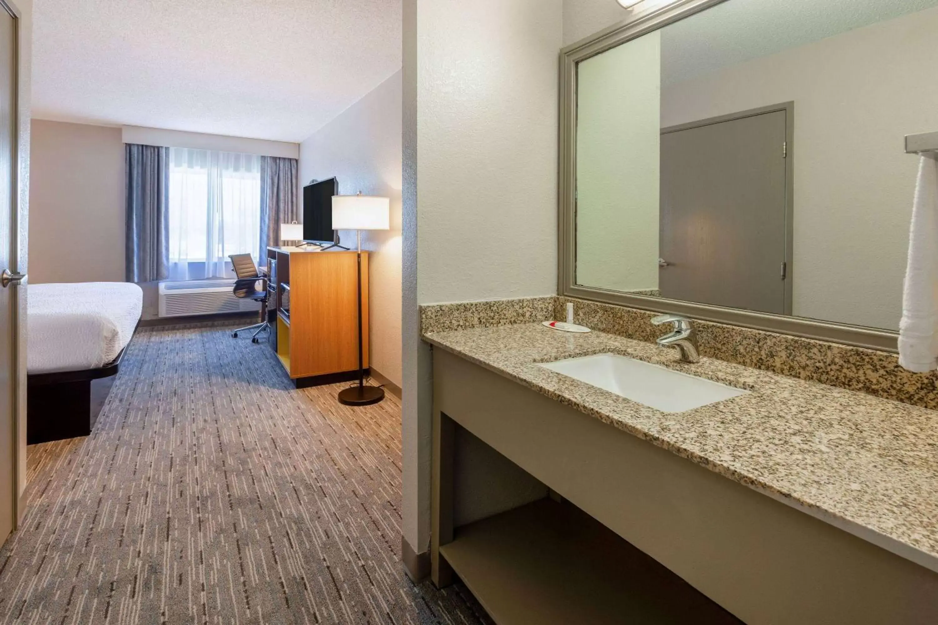 Bathroom in Days Inn by Wyndham Racine/Sturtevant