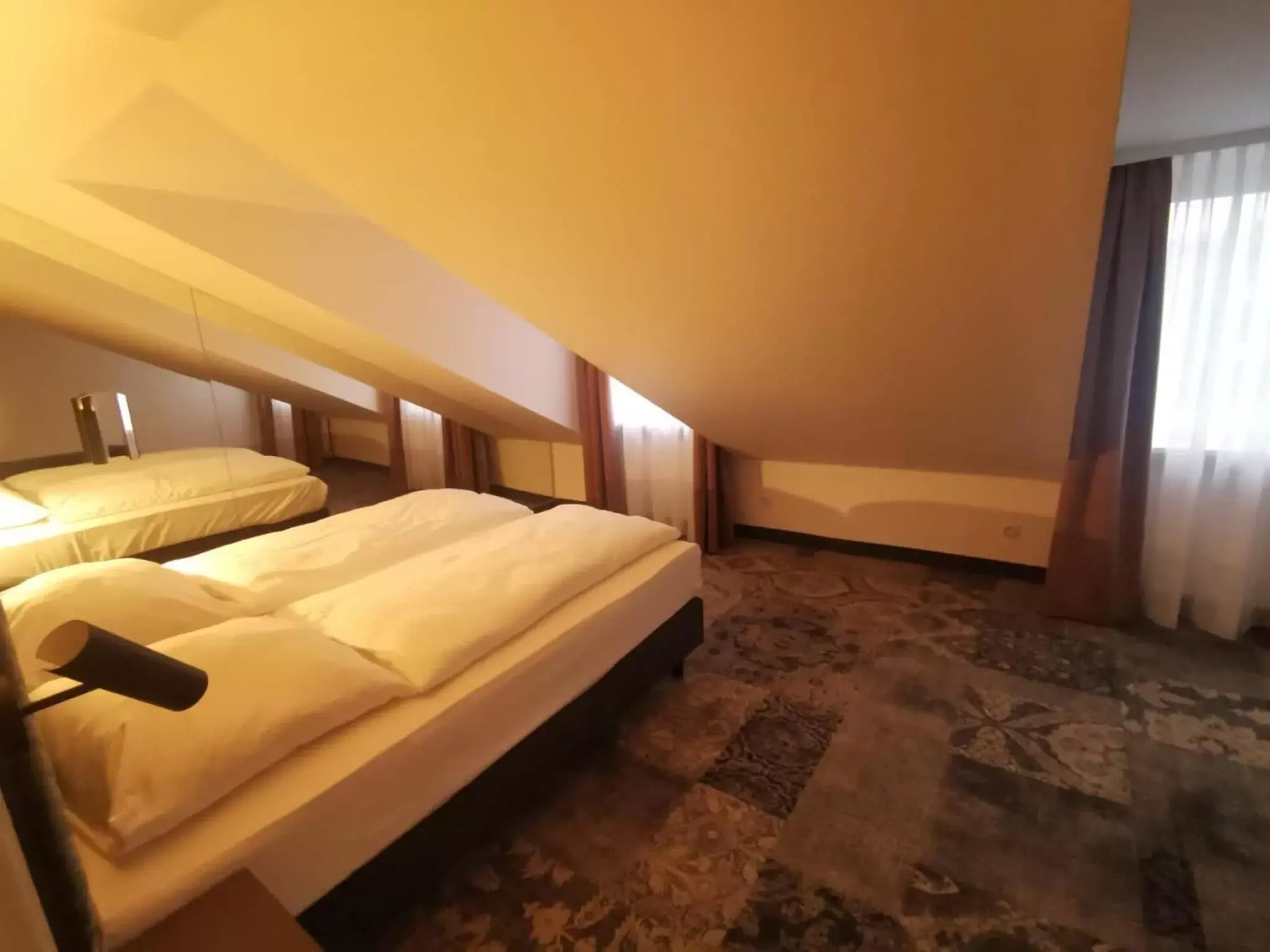 Bed in Hotel Palmenhof
