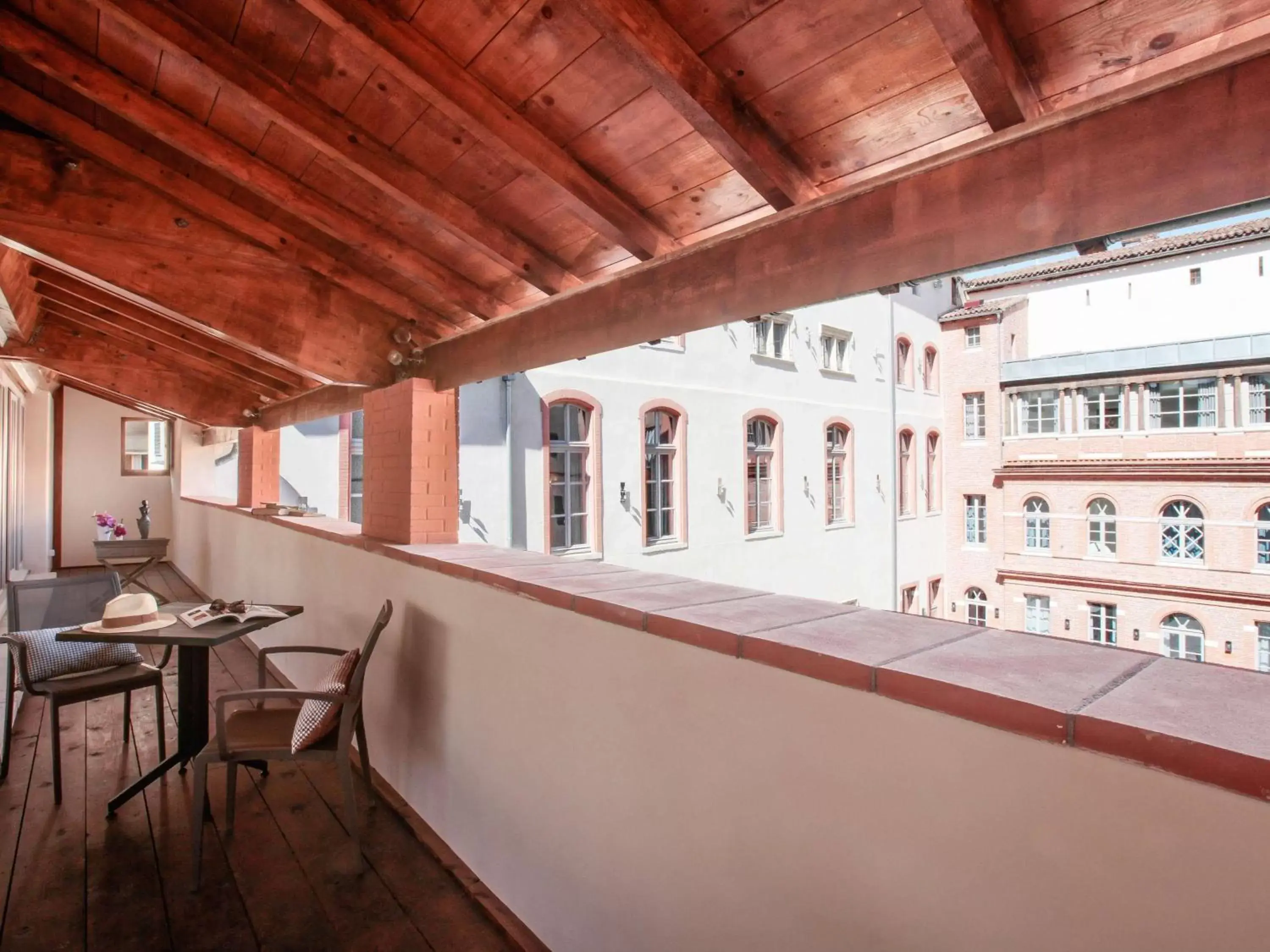 Photo of the whole room, Balcony/Terrace in La Cour des Consuls Hotel and Spa Toulouse - MGallery