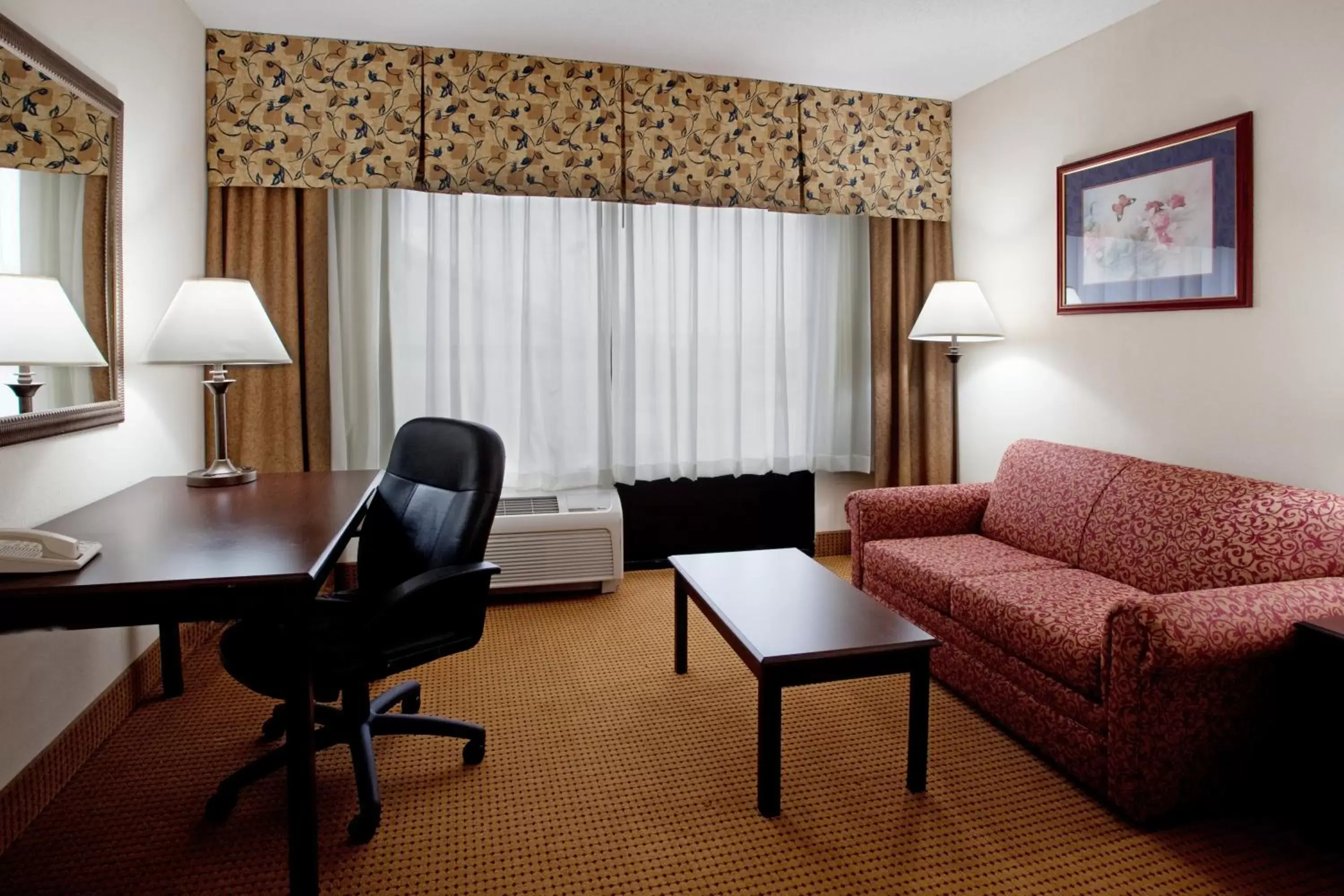 Photo of the whole room, Seating Area in Lexington Inn and Suites