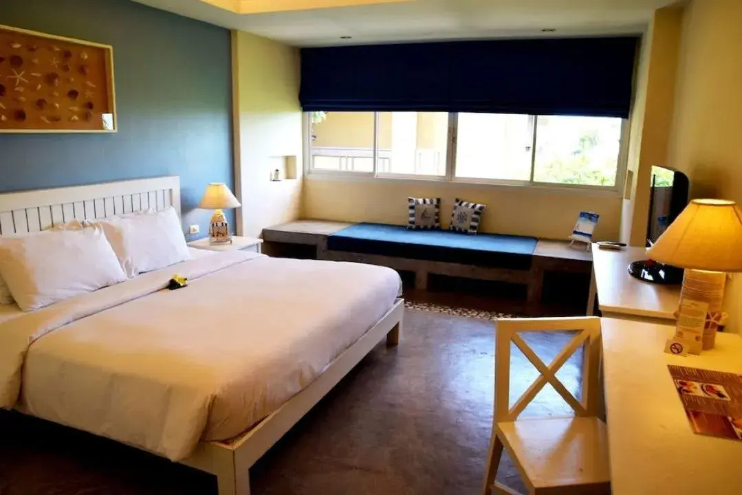 Photo of the whole room, Bed in Deva Beach Resort Samui