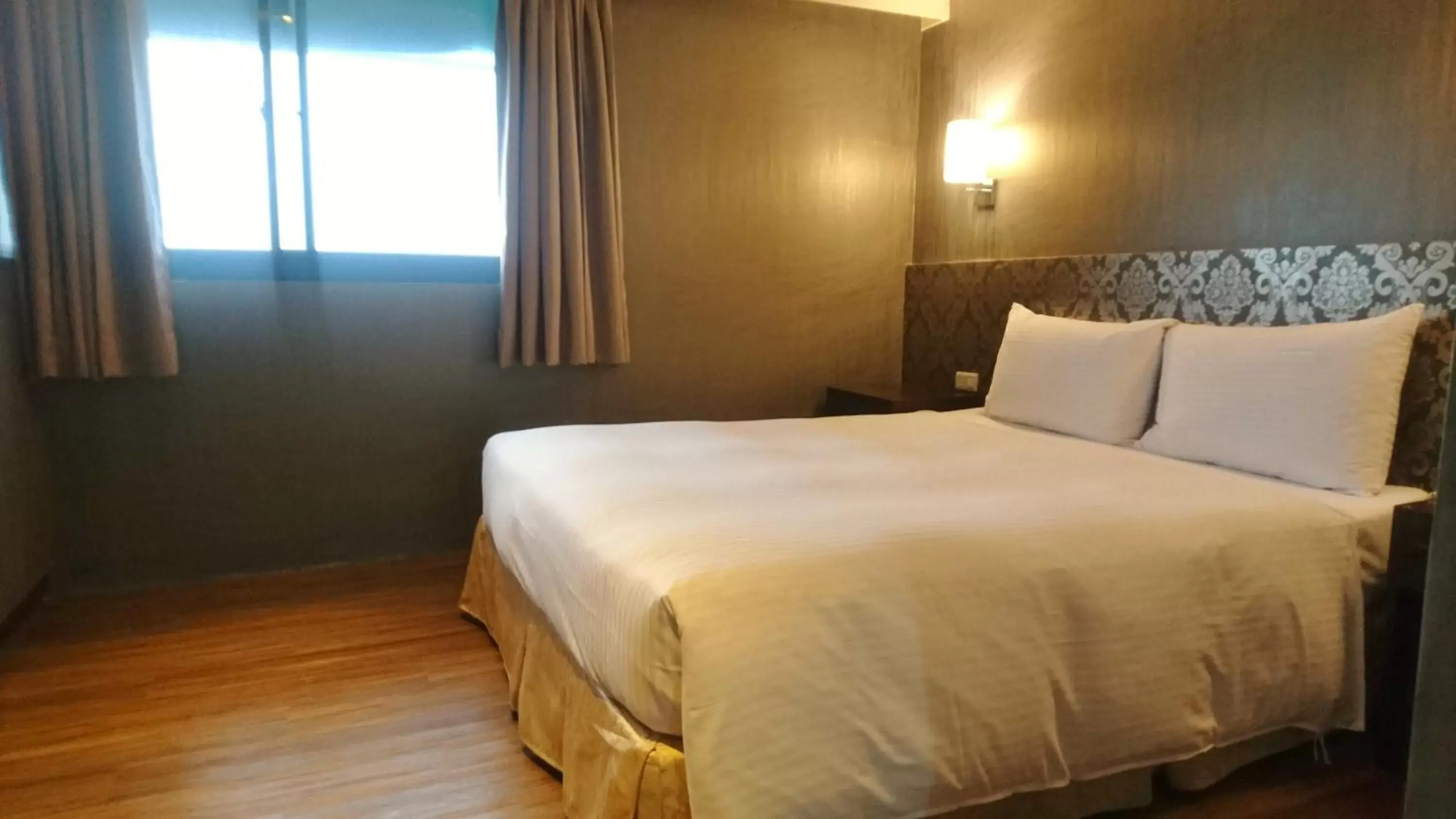 Photo of the whole room, Bed in LIHO Hotel Tainan