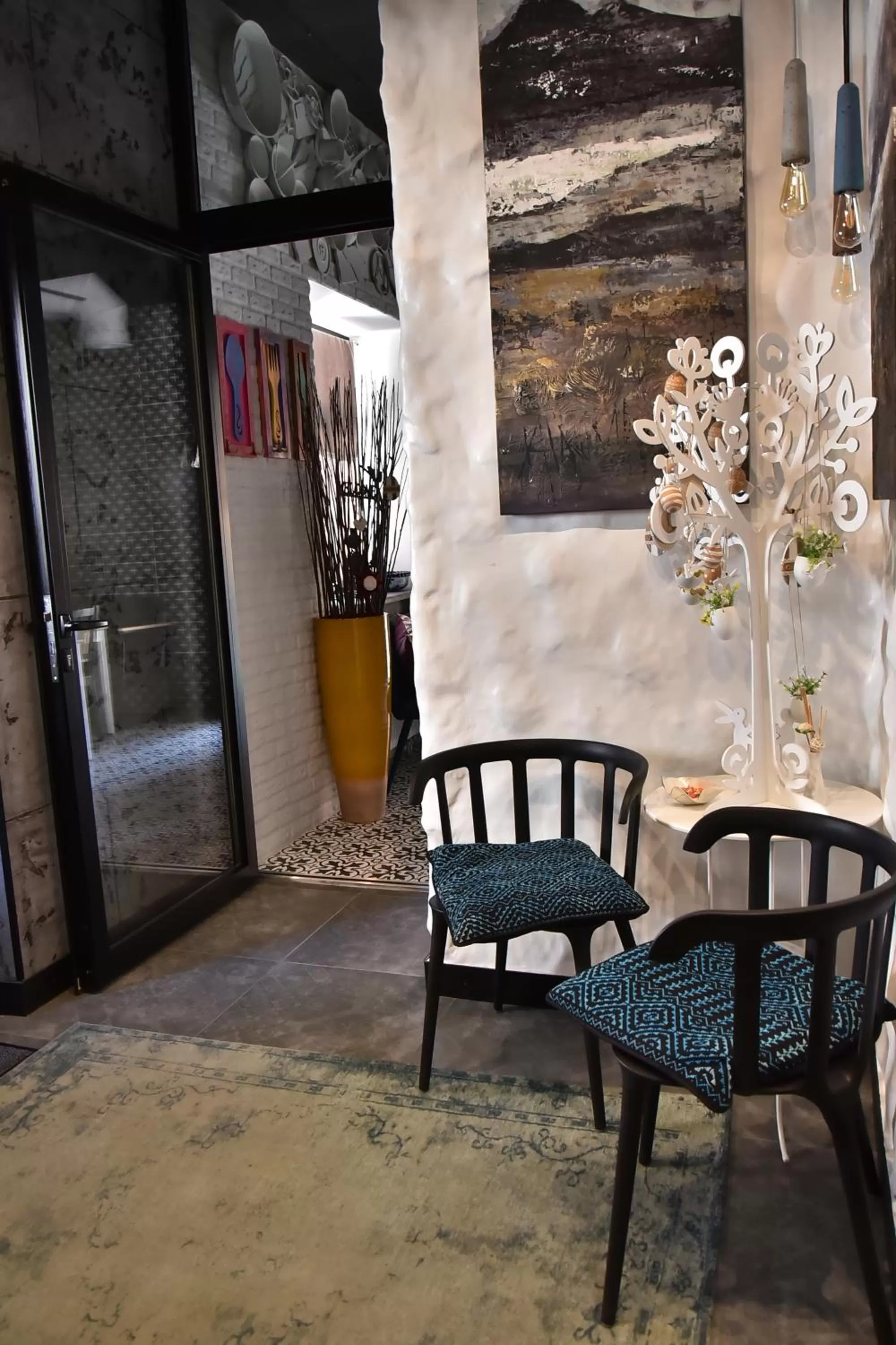 Communal lounge/ TV room in MaNNa Boutique Hotel