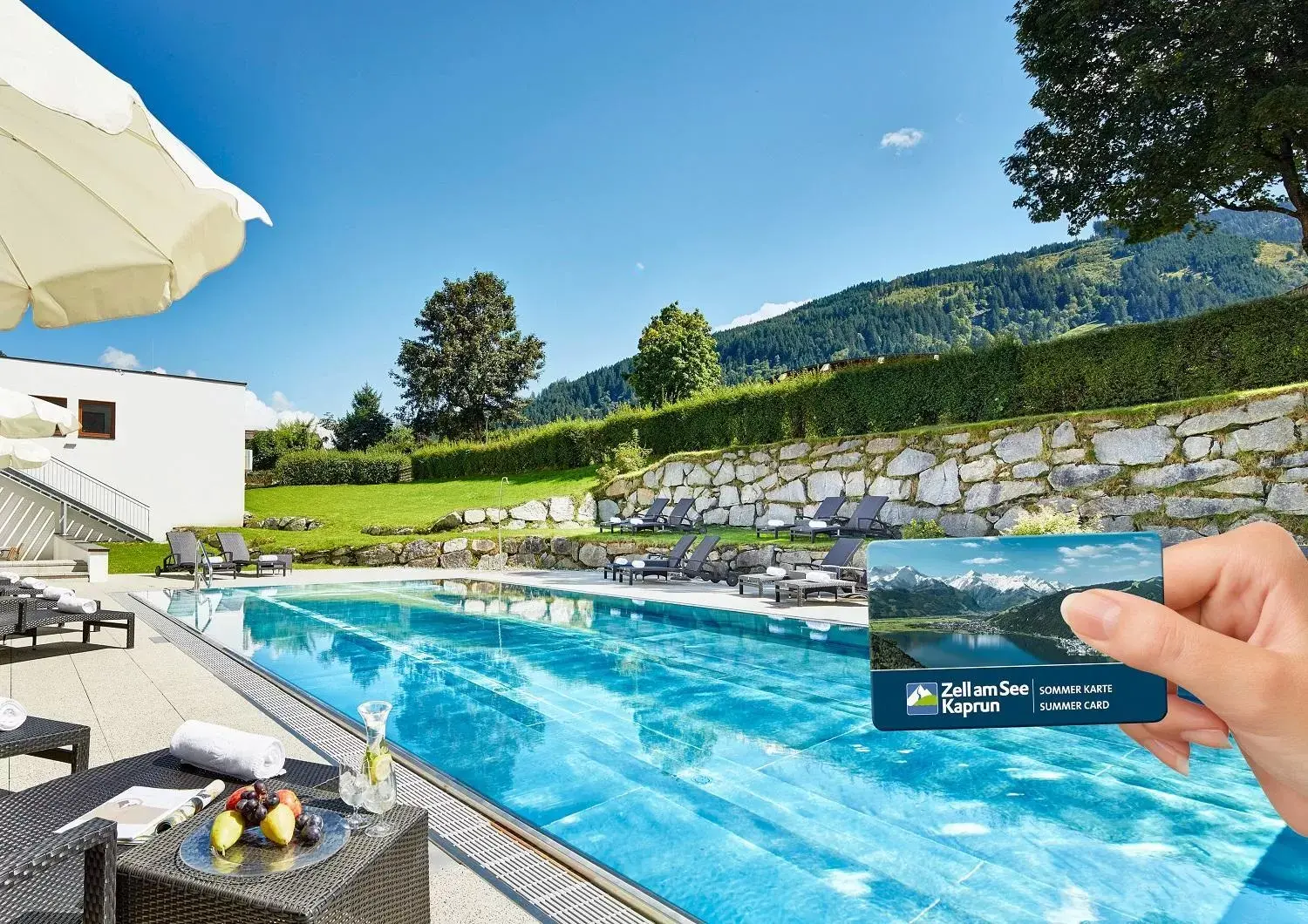 Pool view, Swimming Pool in Das Alpenhaus Kaprun