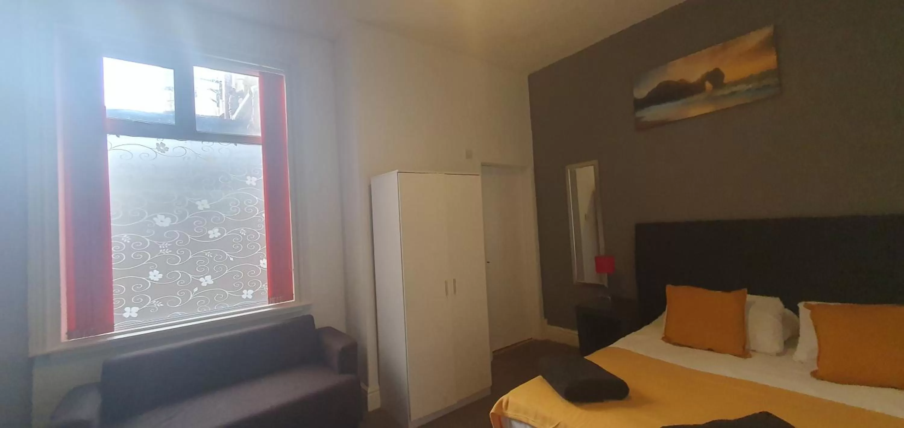 Bed in Palm Beach Hotel by the Sea