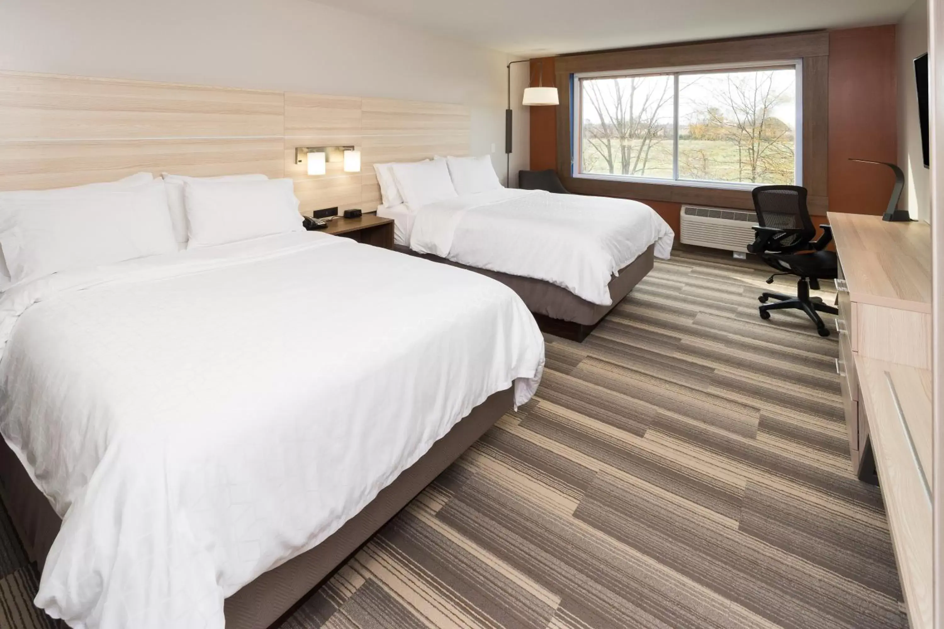 Bed in Holiday Inn Express Hotel & Suites Logansport, an IHG Hotel