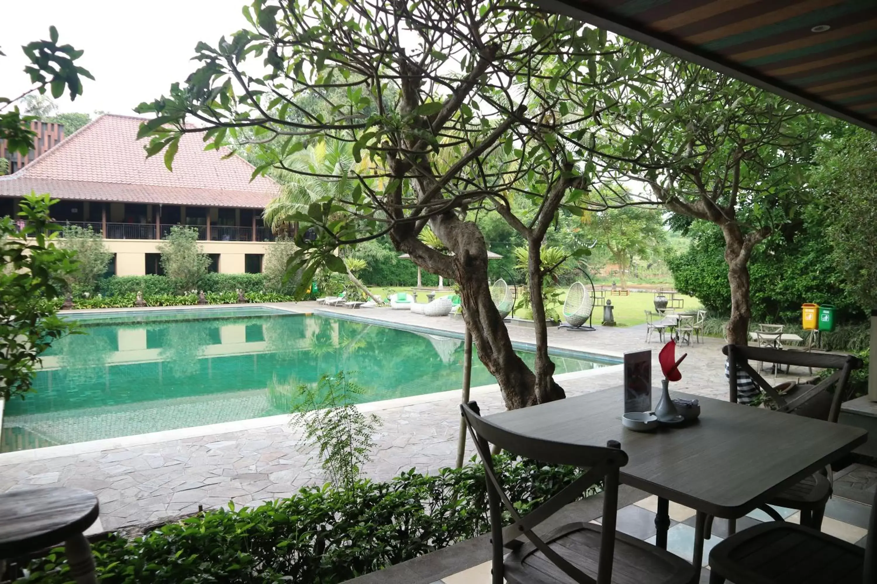 Seating area, Swimming Pool in Amanuba Hotel & Resort Rancamaya