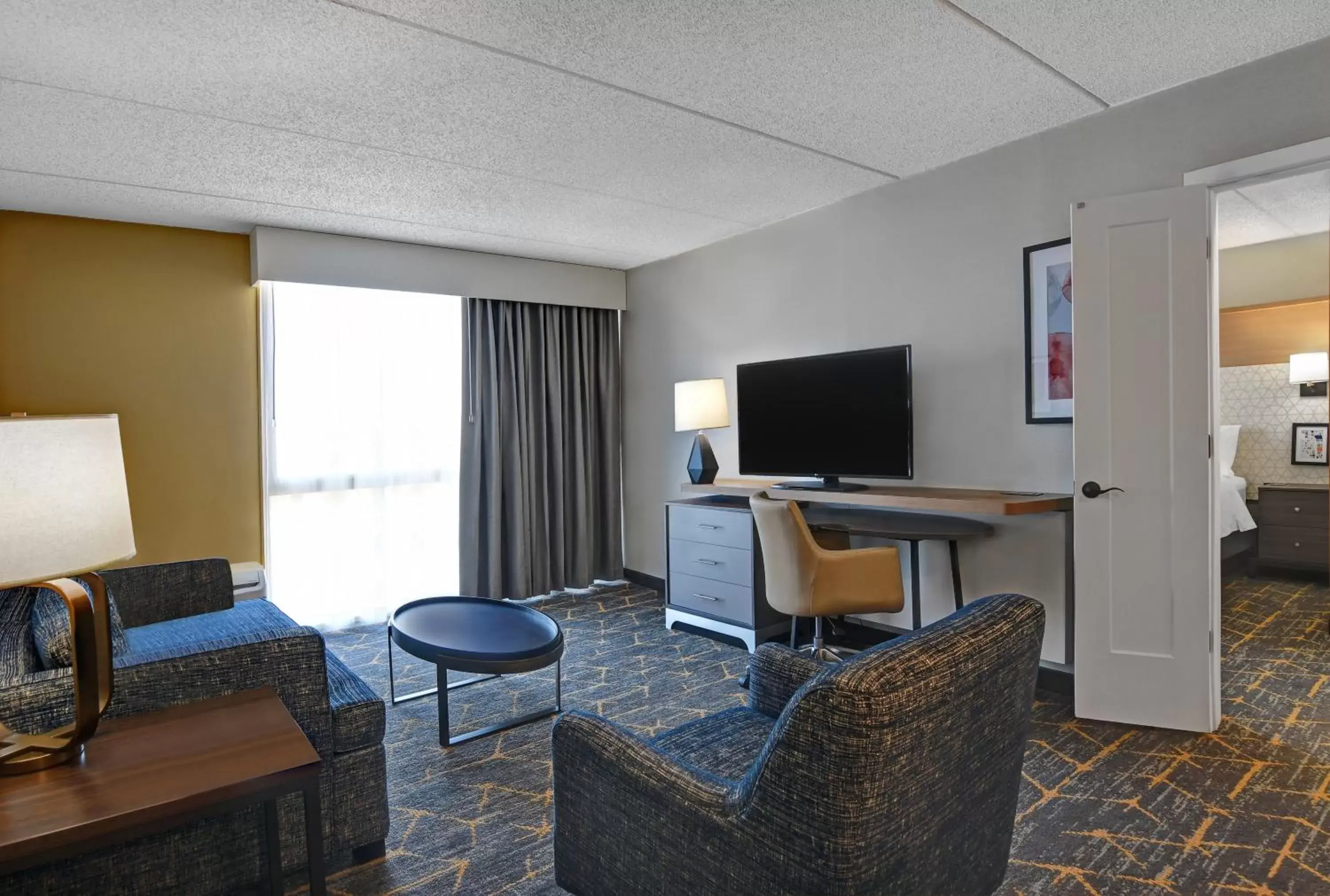 Photo of the whole room, TV/Entertainment Center in Holiday Inn Philadelphia-Cherry Hill, an IHG Hotel