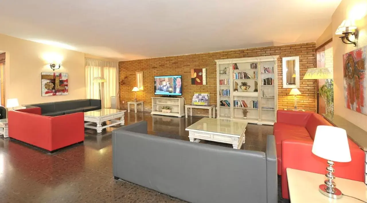 Communal lounge/ TV room, Seating Area in Hotel Salobreña Suites