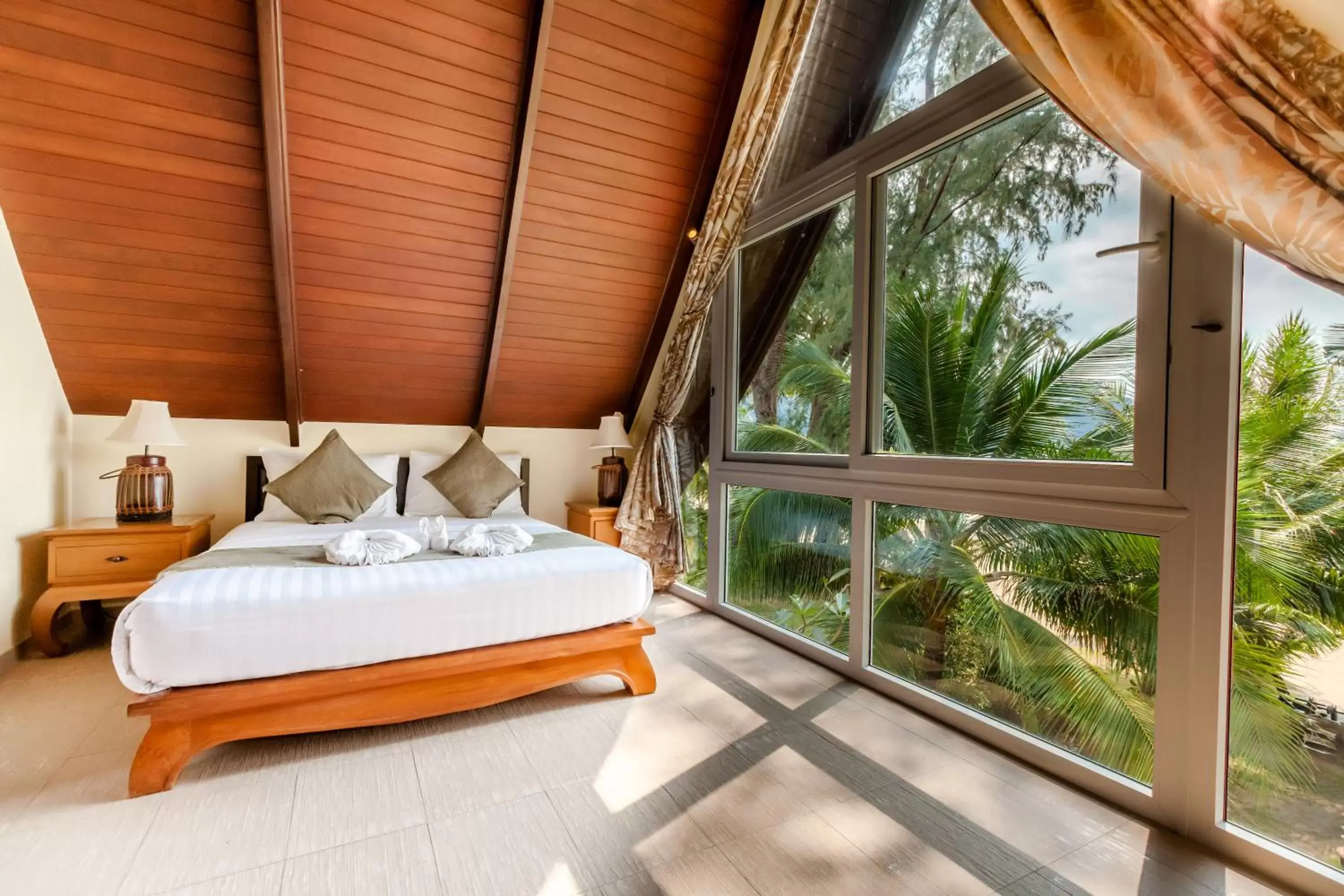 Bed in Little Sunshine Boutique Beach Resort & Spa