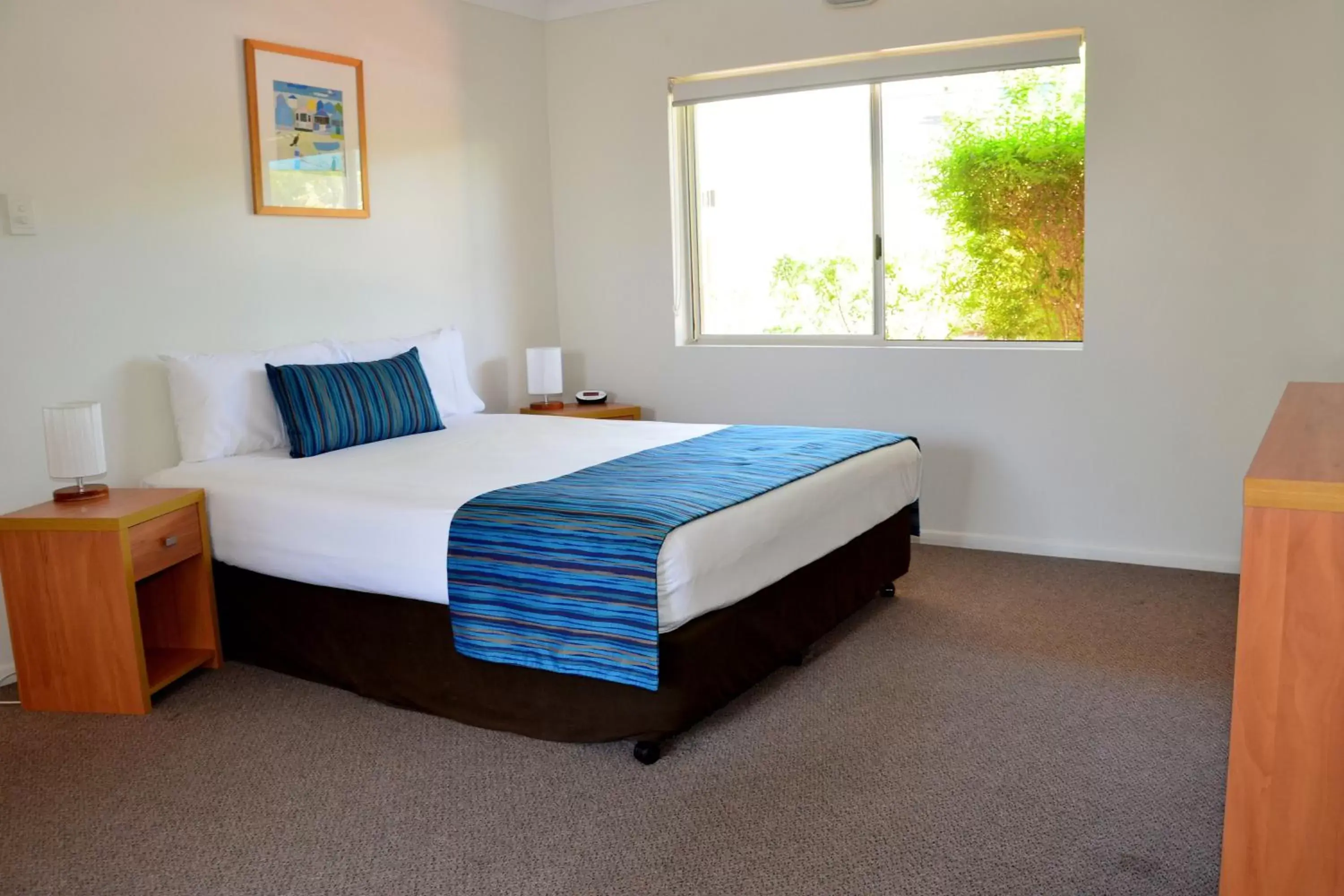 Bed in Arlia Sands Apartments