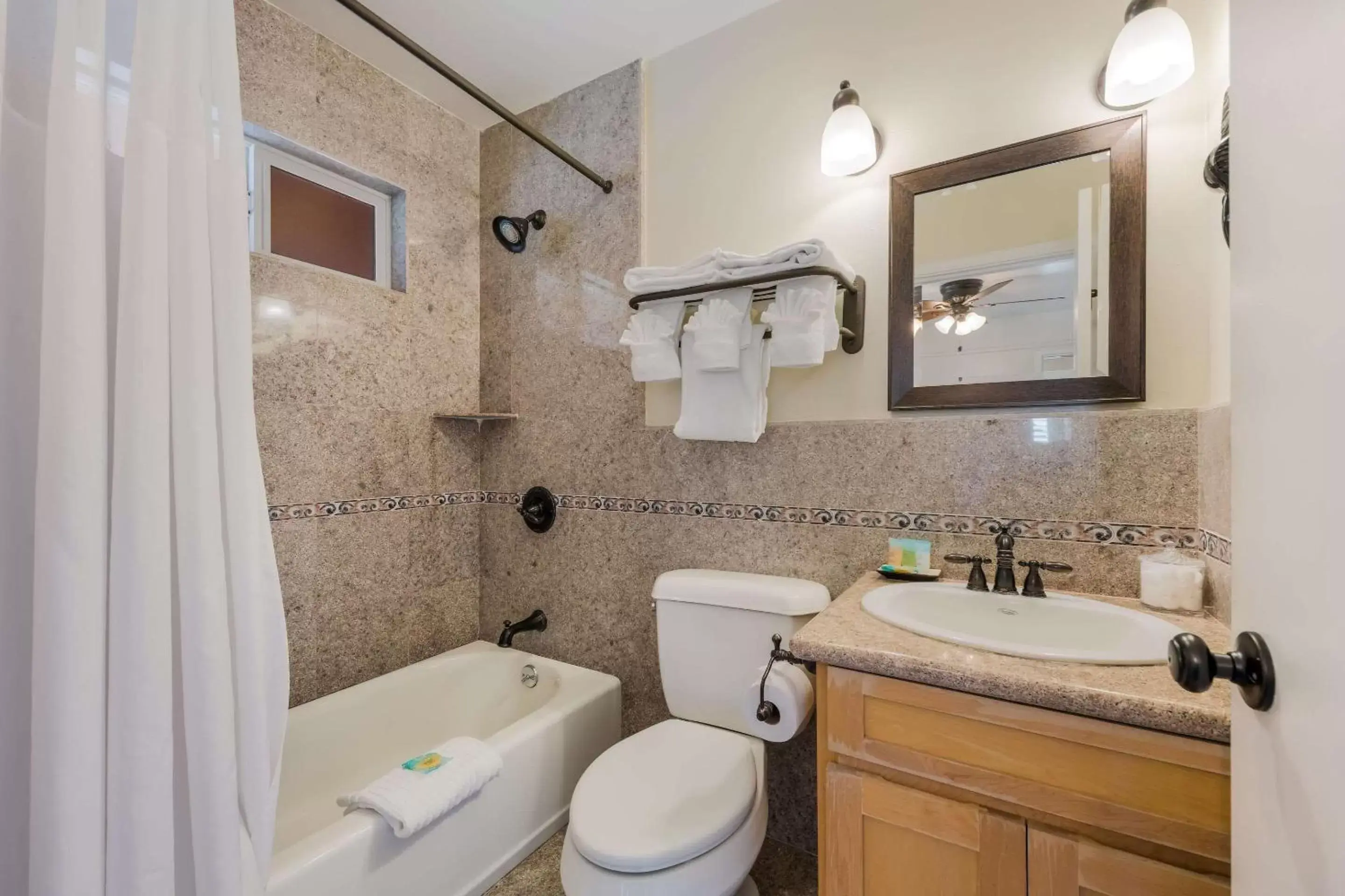 Shower, Bathroom in Clarion Collection Carmel Oaks Inn