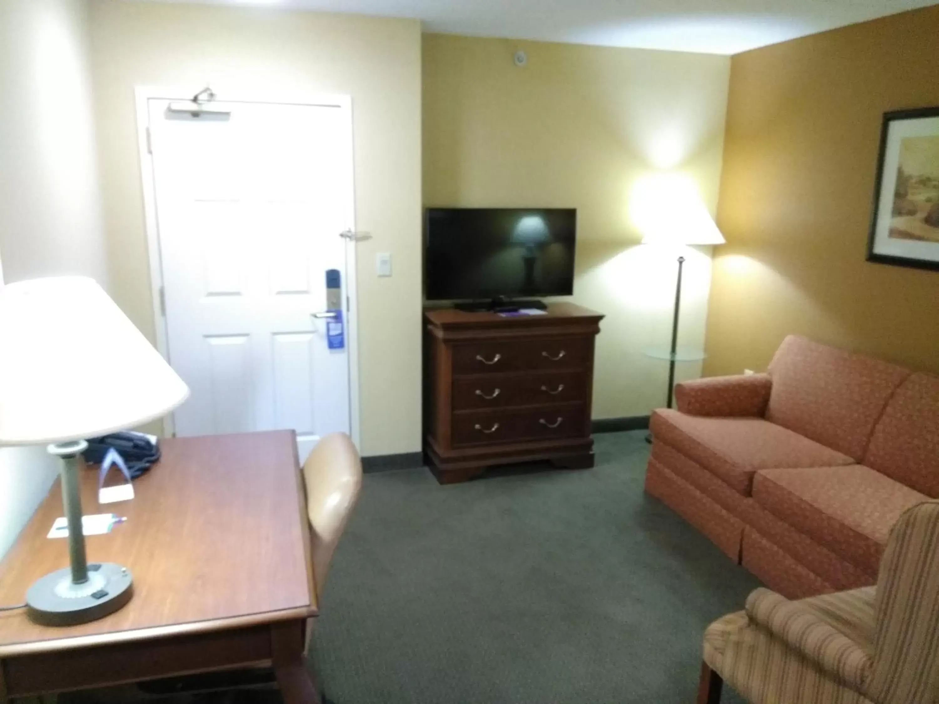 Living room, TV/Entertainment Center in Baymont by Wyndham Clinton