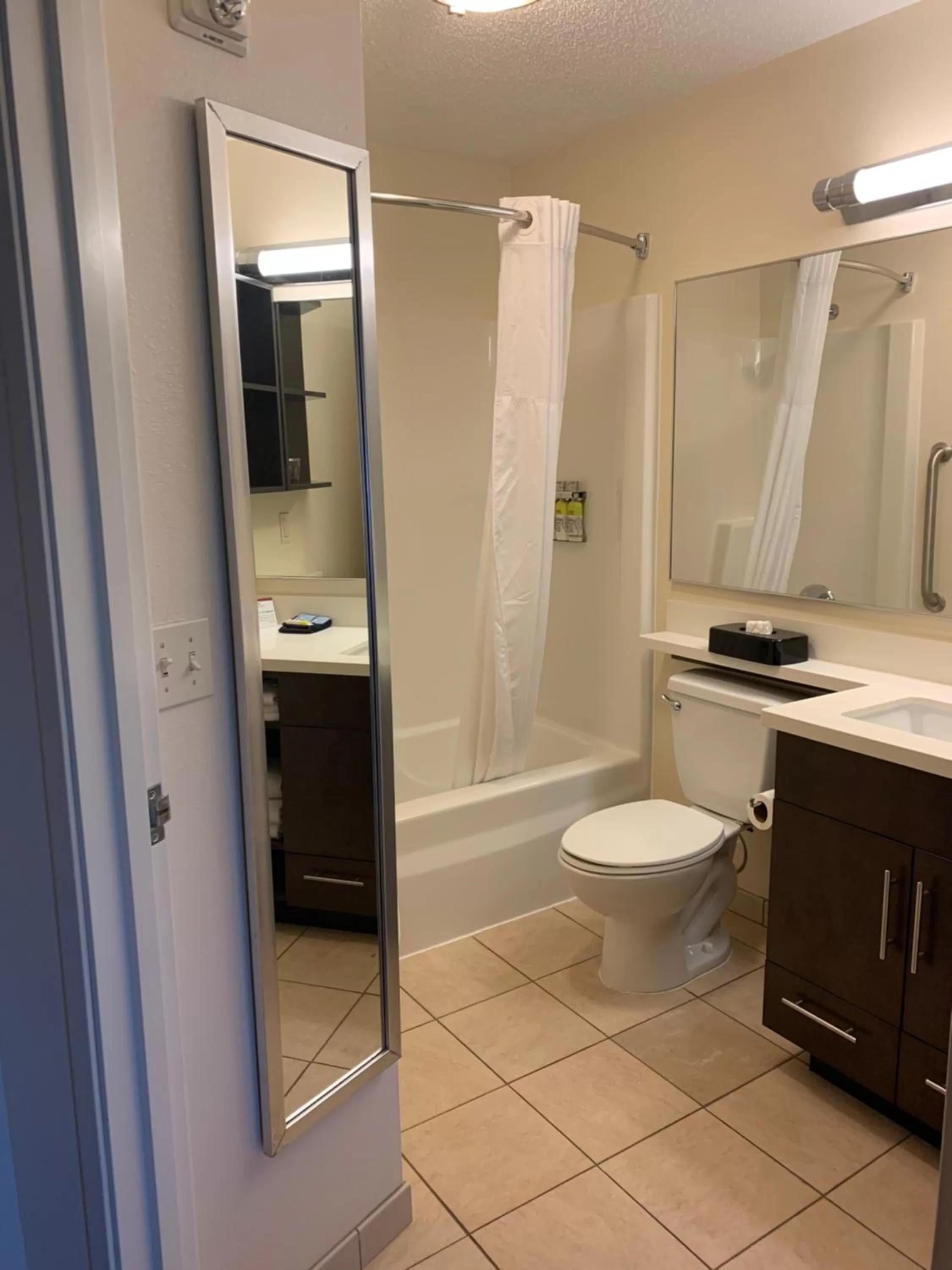 Bathroom in Candlewood Suites Fargo-North Dakota State University by IHG