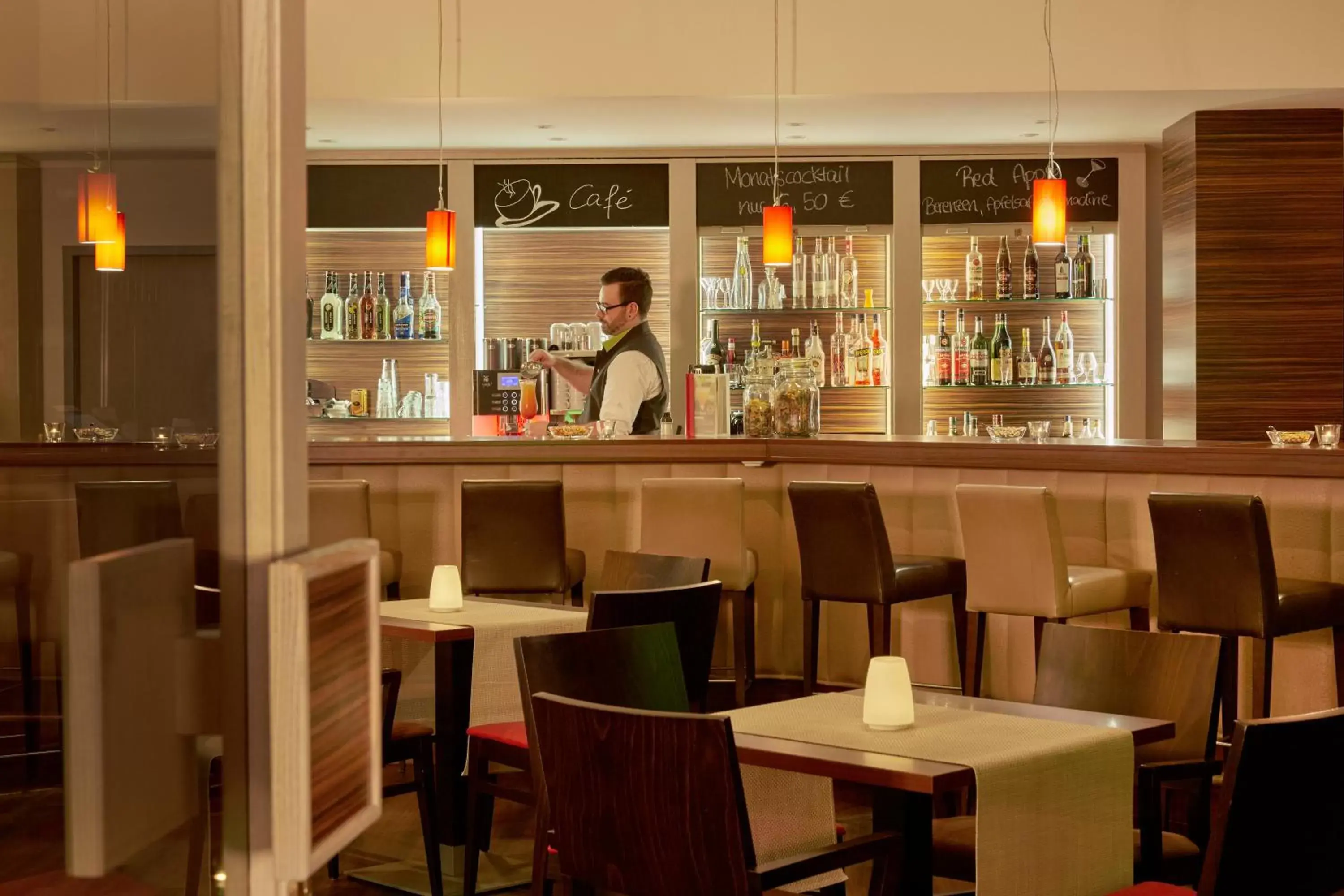 Lounge or bar in H+ Hotel Leipzig-Halle Lounge or bar in H+ Hotel Leipzig-Halle