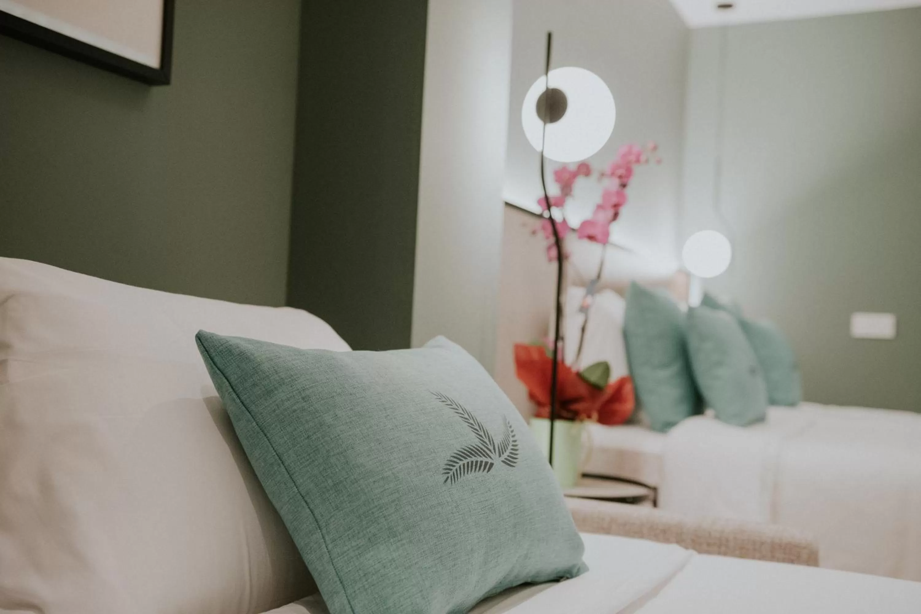 Bed in Catalina Plaza Hotel Sostenible