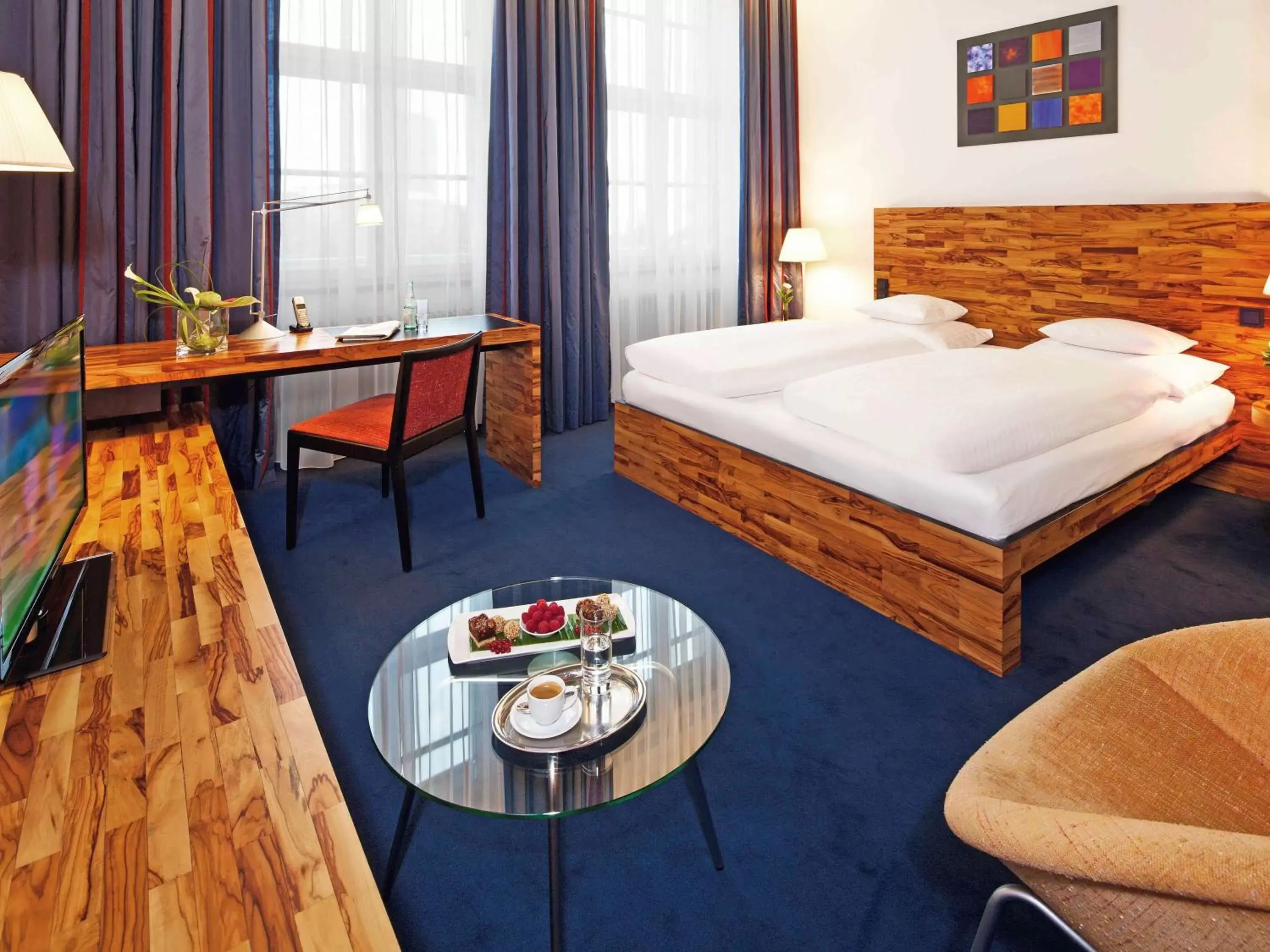 Photo of the whole room, Bed in Mövenpick Hotel Berlin Am Potsdamer Platz