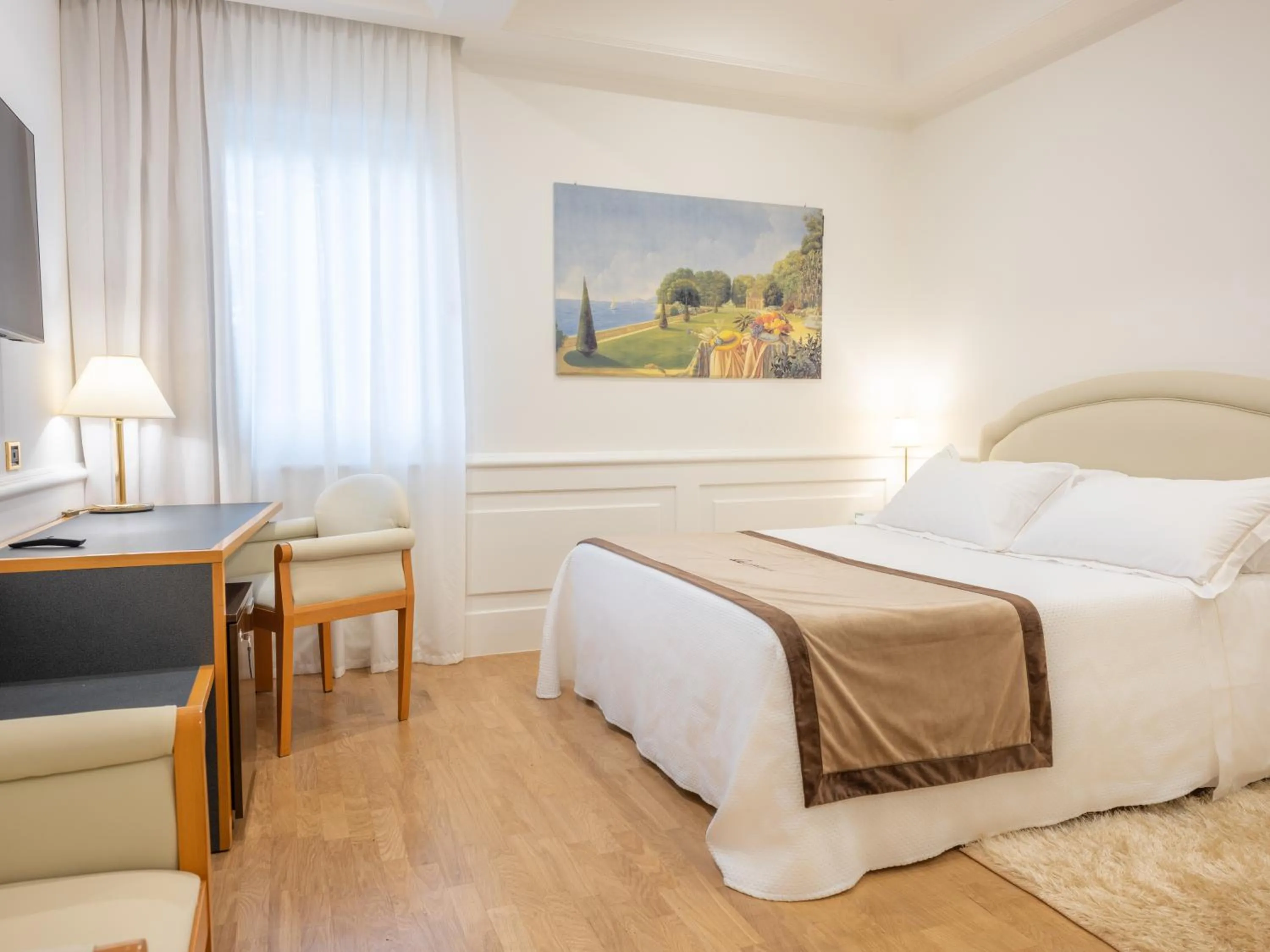 Bed in Mirabella Hotel