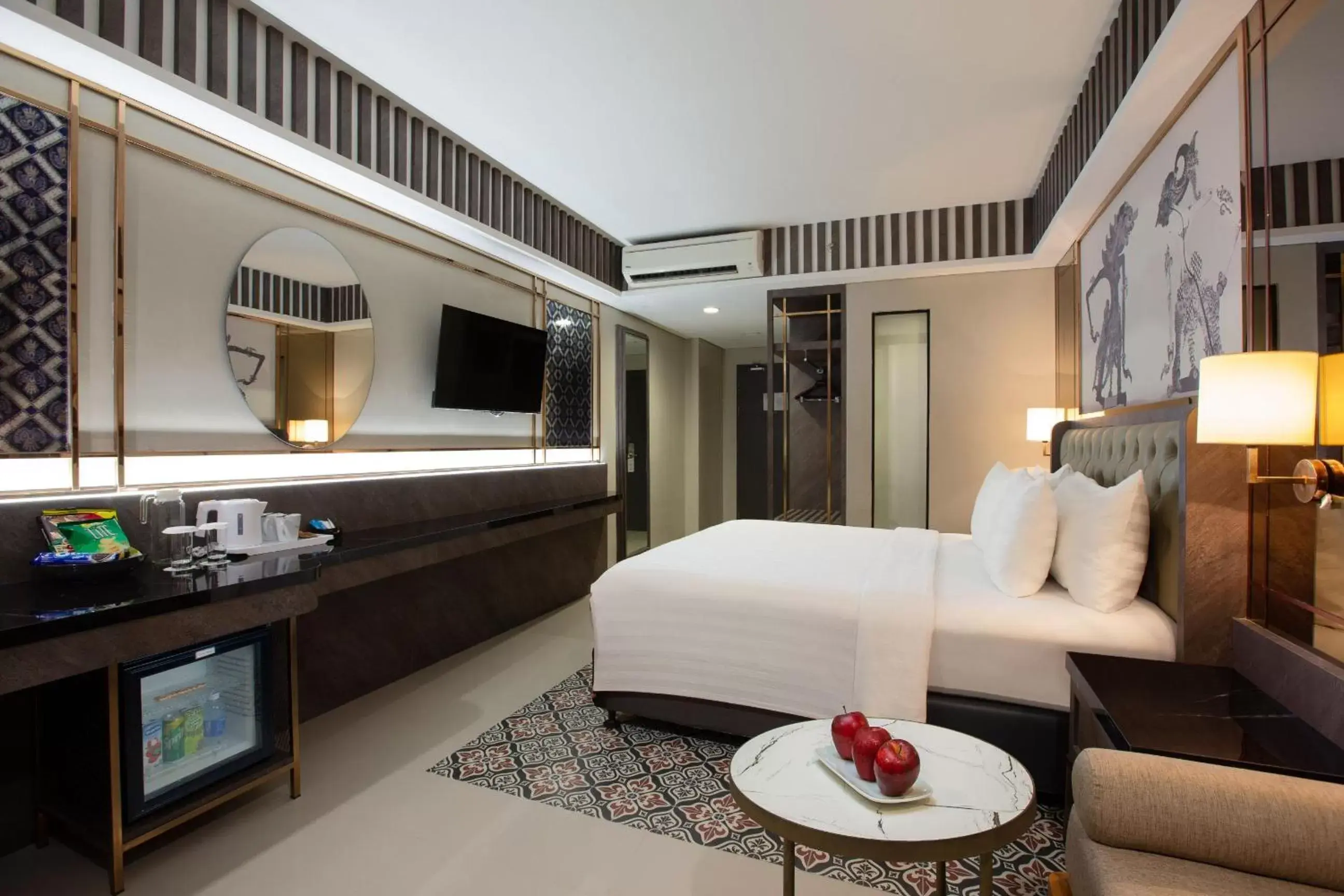 Bedroom in The Alana Hotel & Conference Center Malioboro Yogyakarta by ASTON